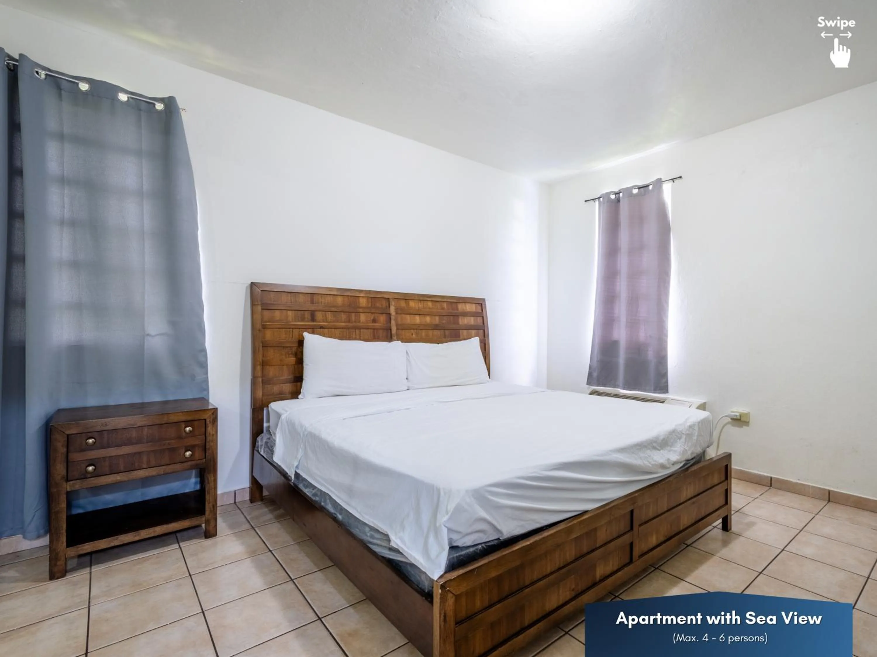 Bedroom in West Coast Inn's