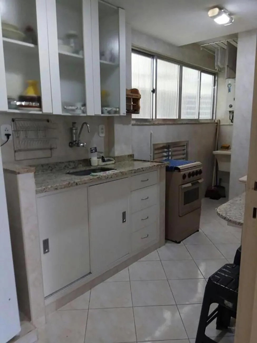 Communal kitchen in Apto Temporada Cabo Frio