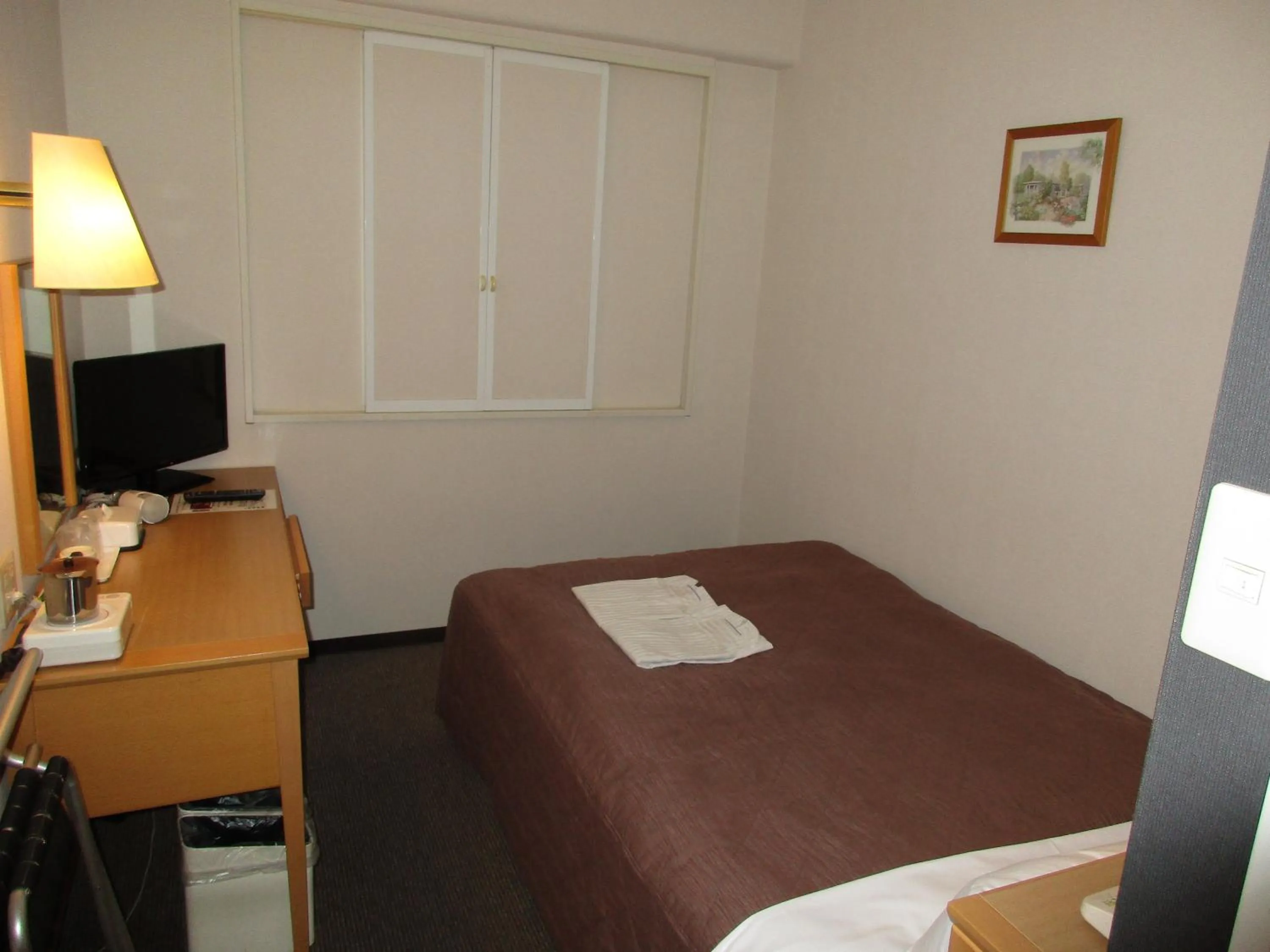 Photo of the whole room, TV/Entertainment Center in Grace Inn Nagoya
