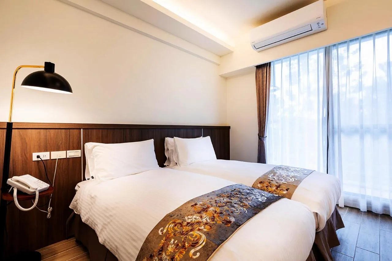 Bed in Hoya Spa Hotel