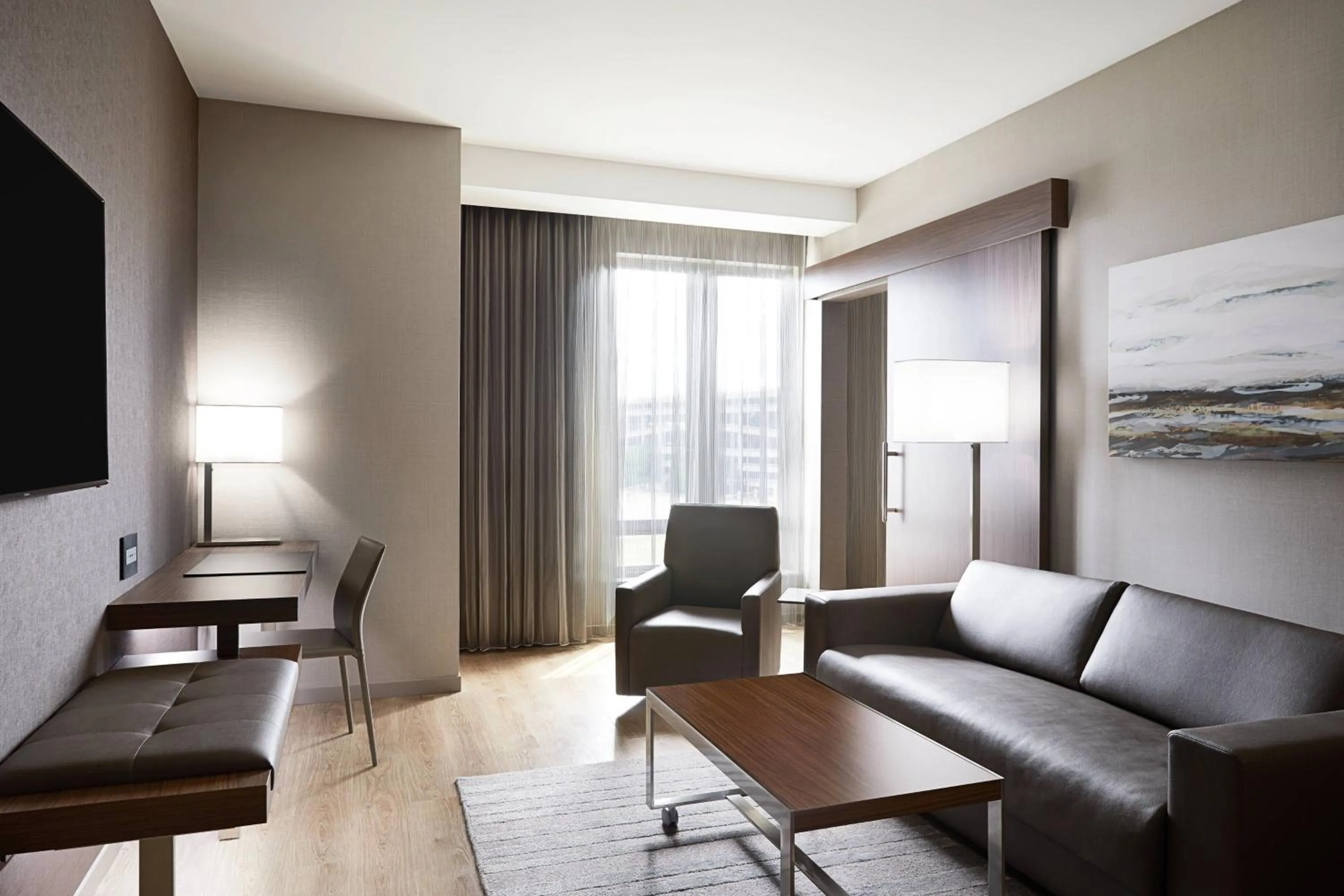 Living room in AC Hotel by Marriott Bloomington Mall of America