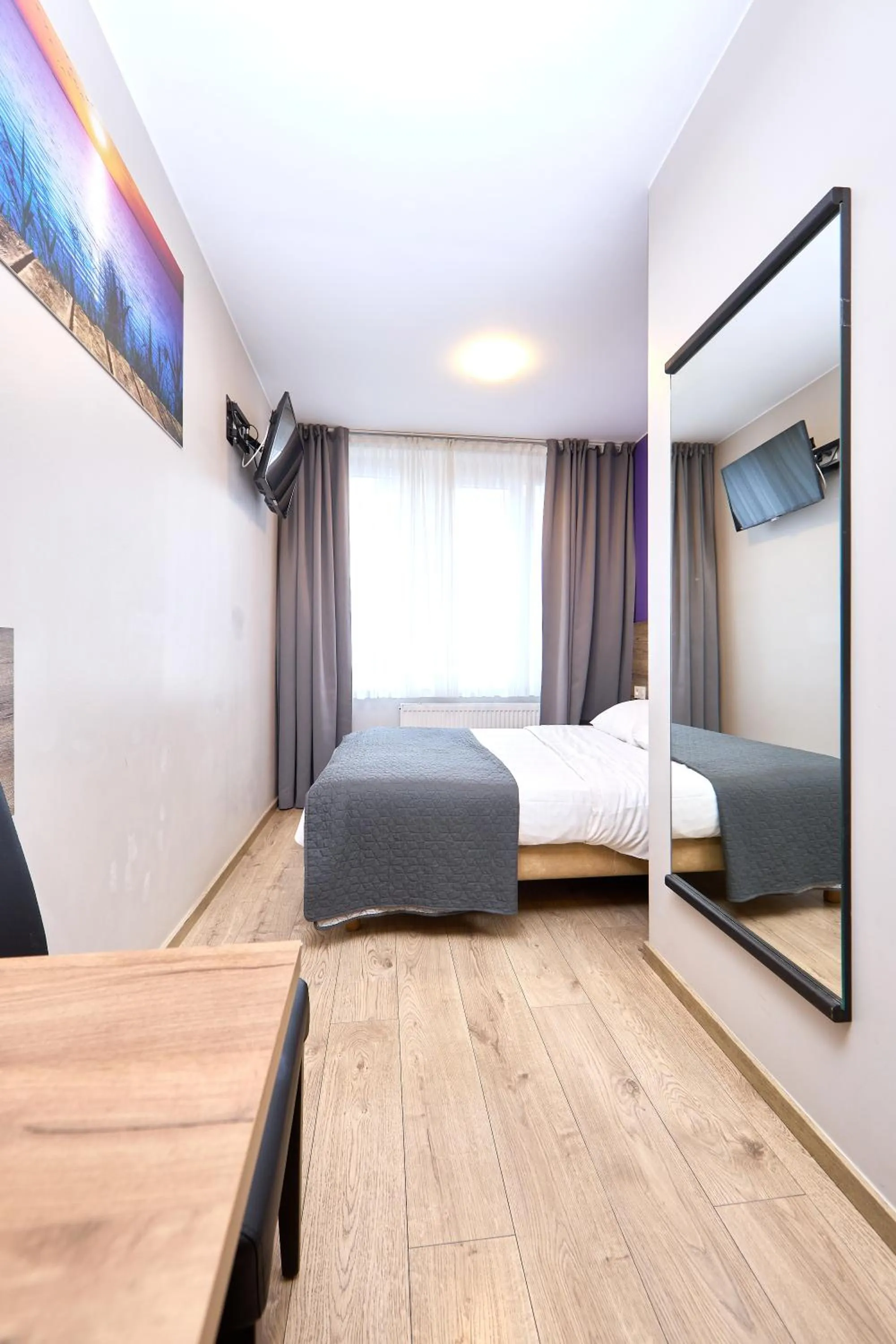 Photo of the whole room, Bed in Hotel City Center