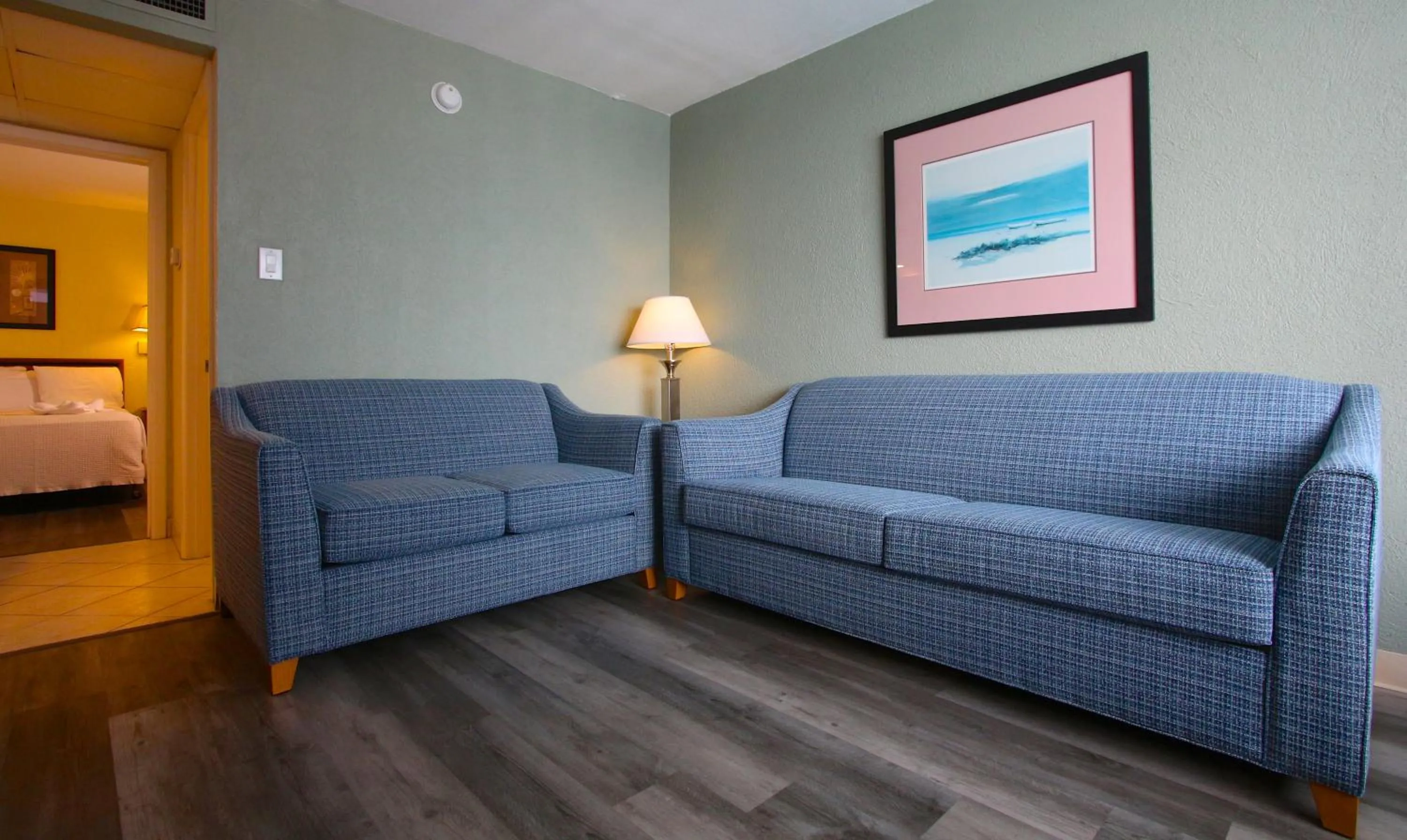 Living room, Bed in Crusader Oceanfront Resort