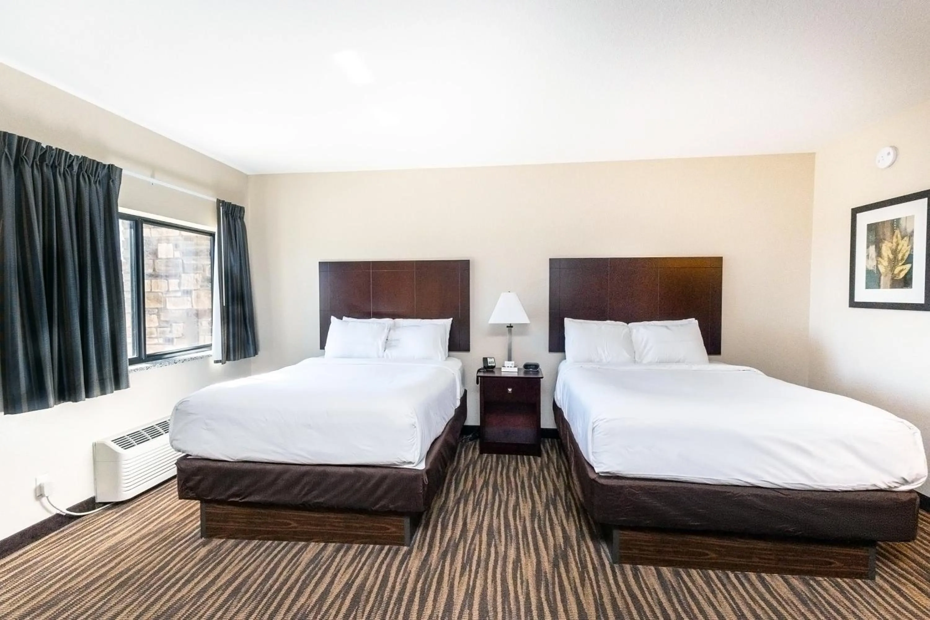 Bed in Cobblestone Inn & Suites Maryville