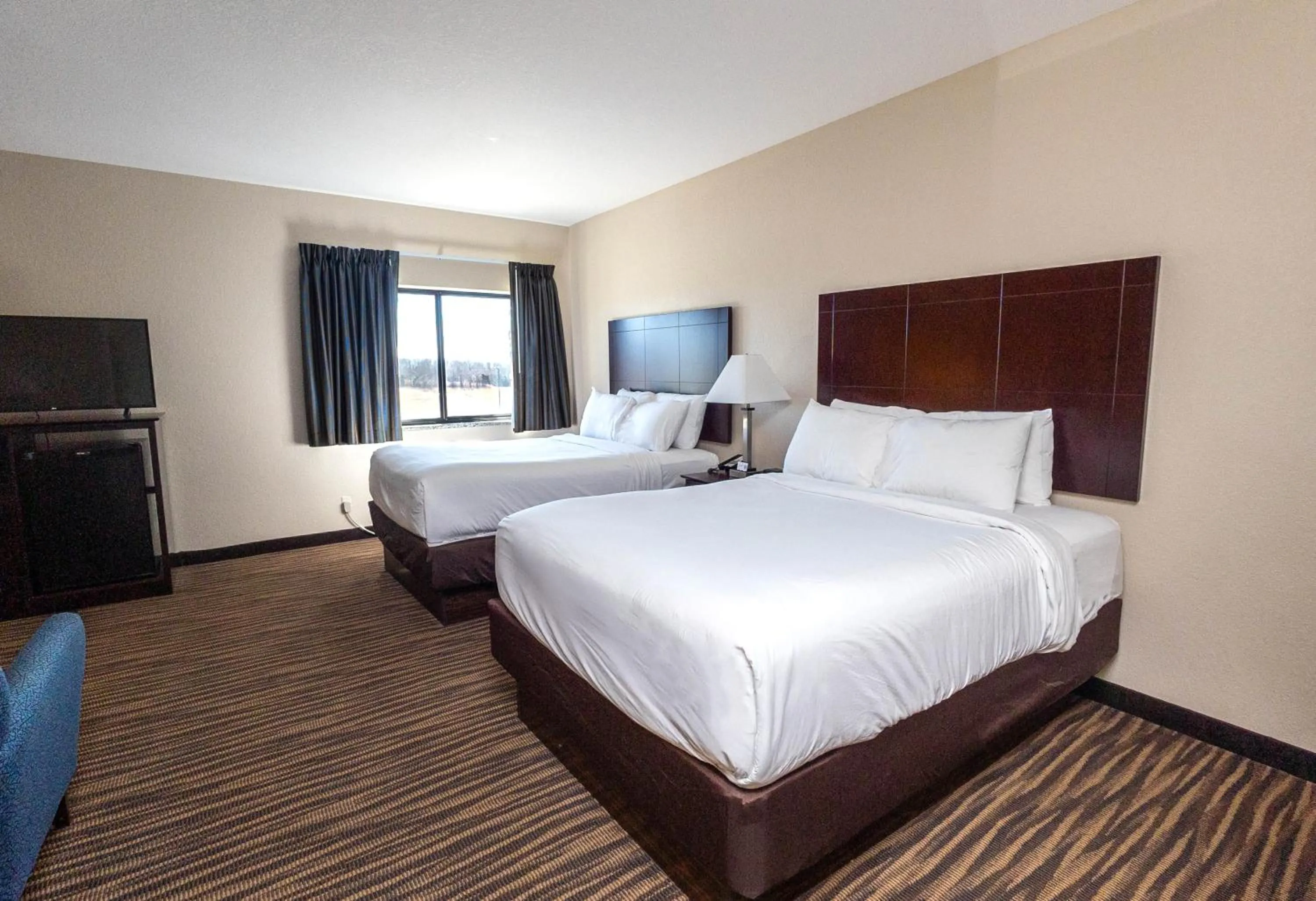 Bed in Cobblestone Inn & Suites Maryville