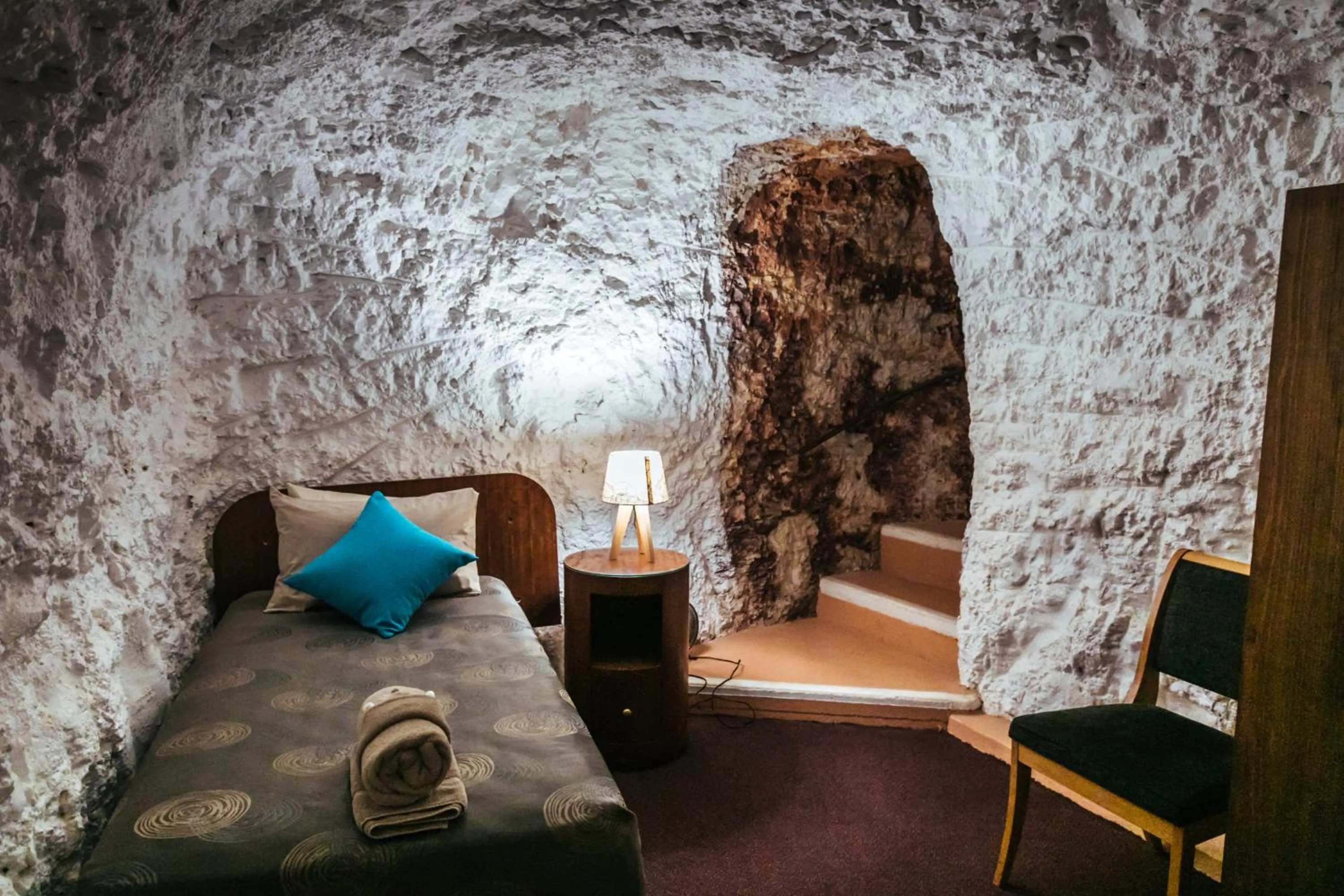 Bed in White Cliffs Underground Motel