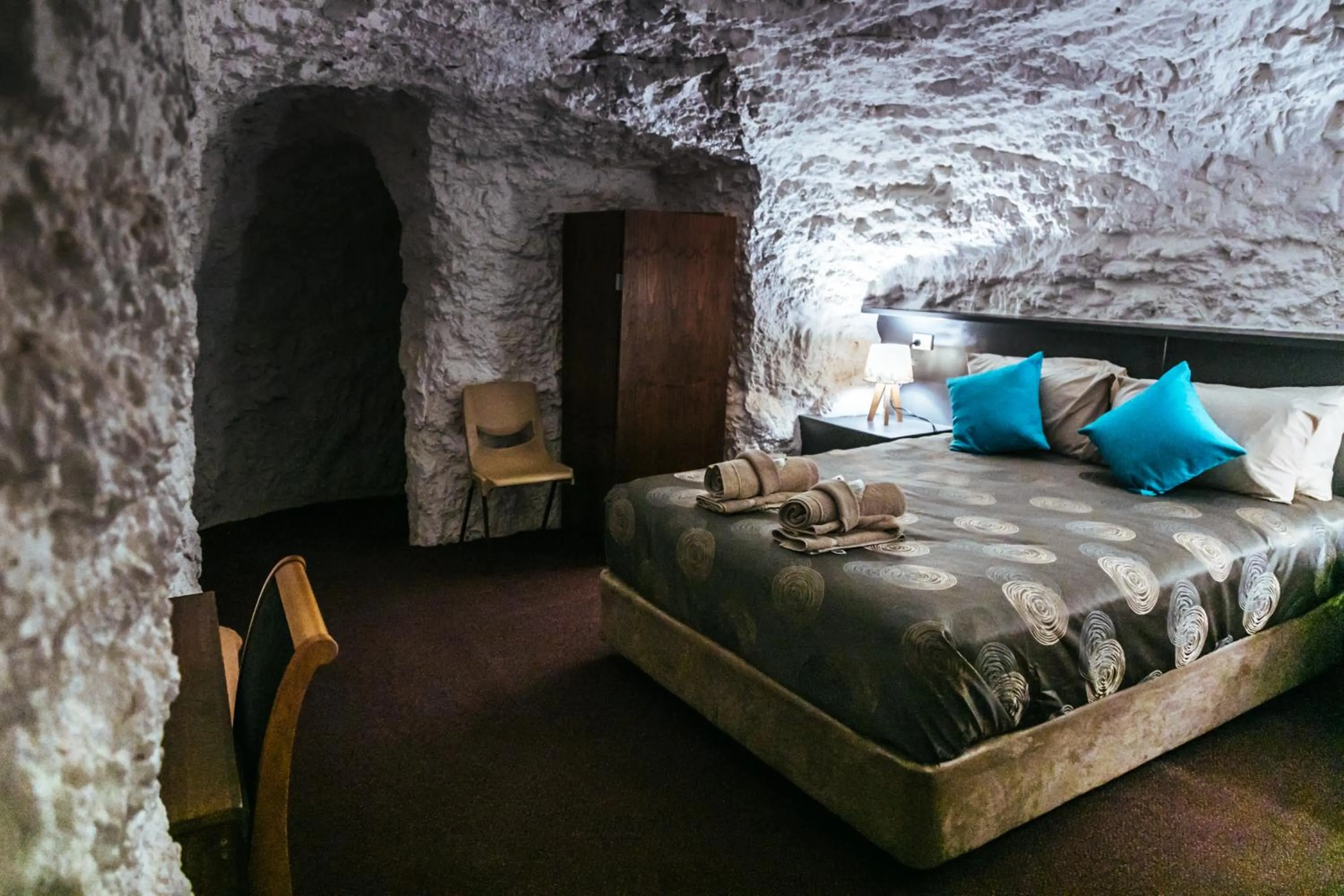 Bed in White Cliffs Underground Motel