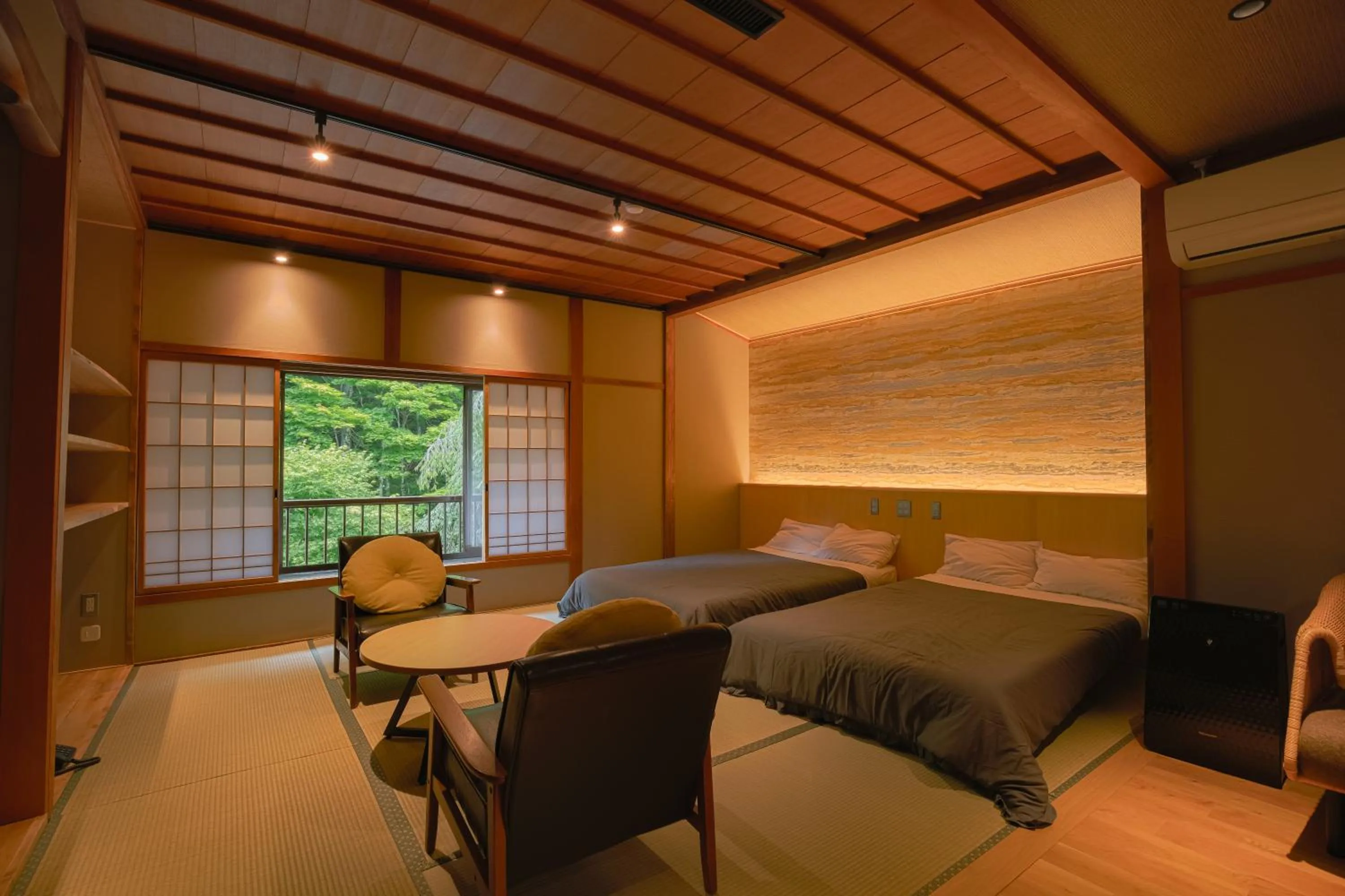 Photo of the whole room, Bed in Nukumorino-yado Komanoyu