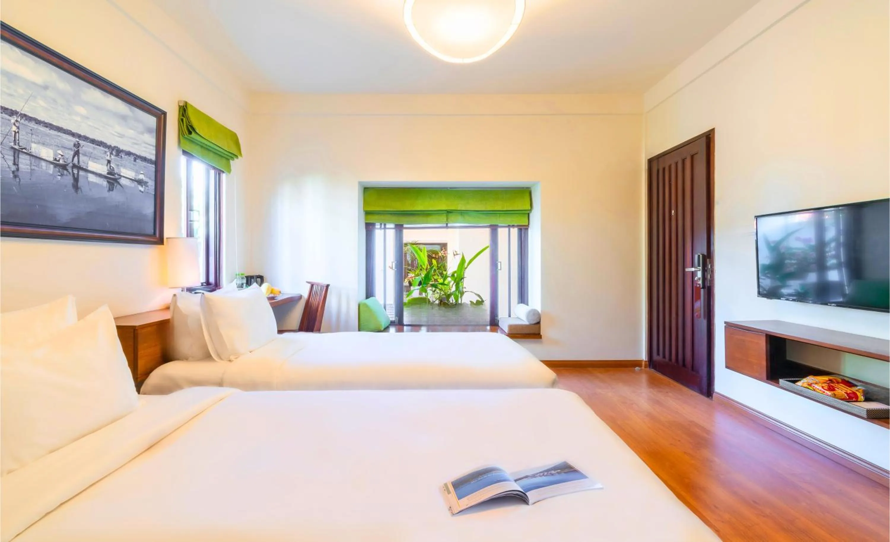 Bed in Elites Riverside Hotel & Spa Hoi An
