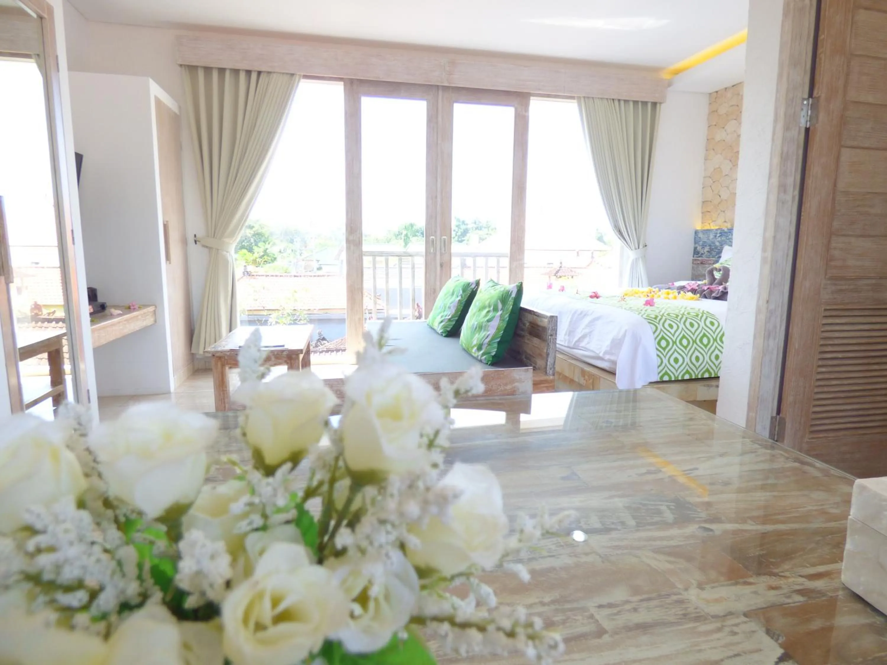 Bed in Green Studio Apartment Sanur