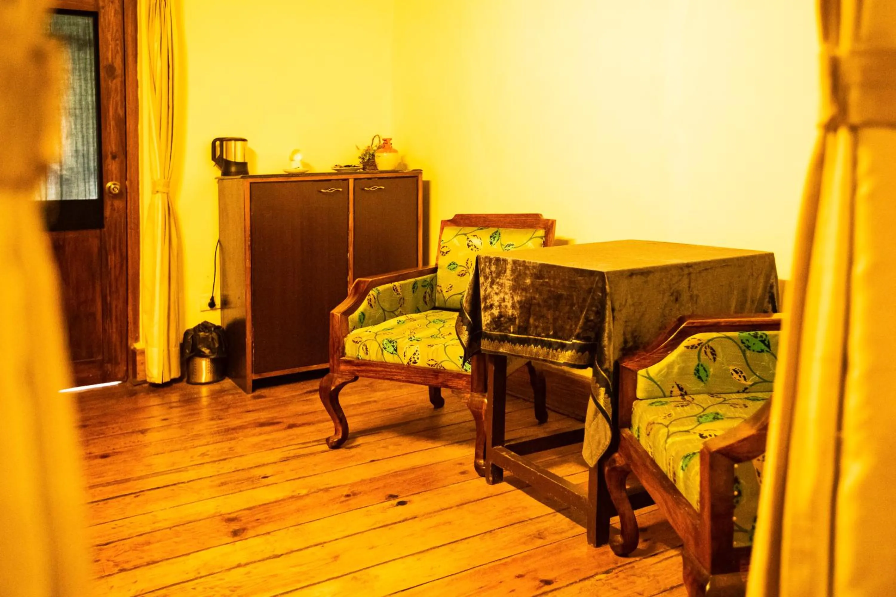 Seating area in The Hive Cottage By Royal Collection Hotels