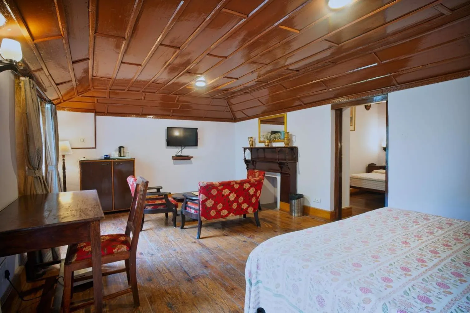 Seating area, Bed in The Hive Cottage By Royal Collection Hotels