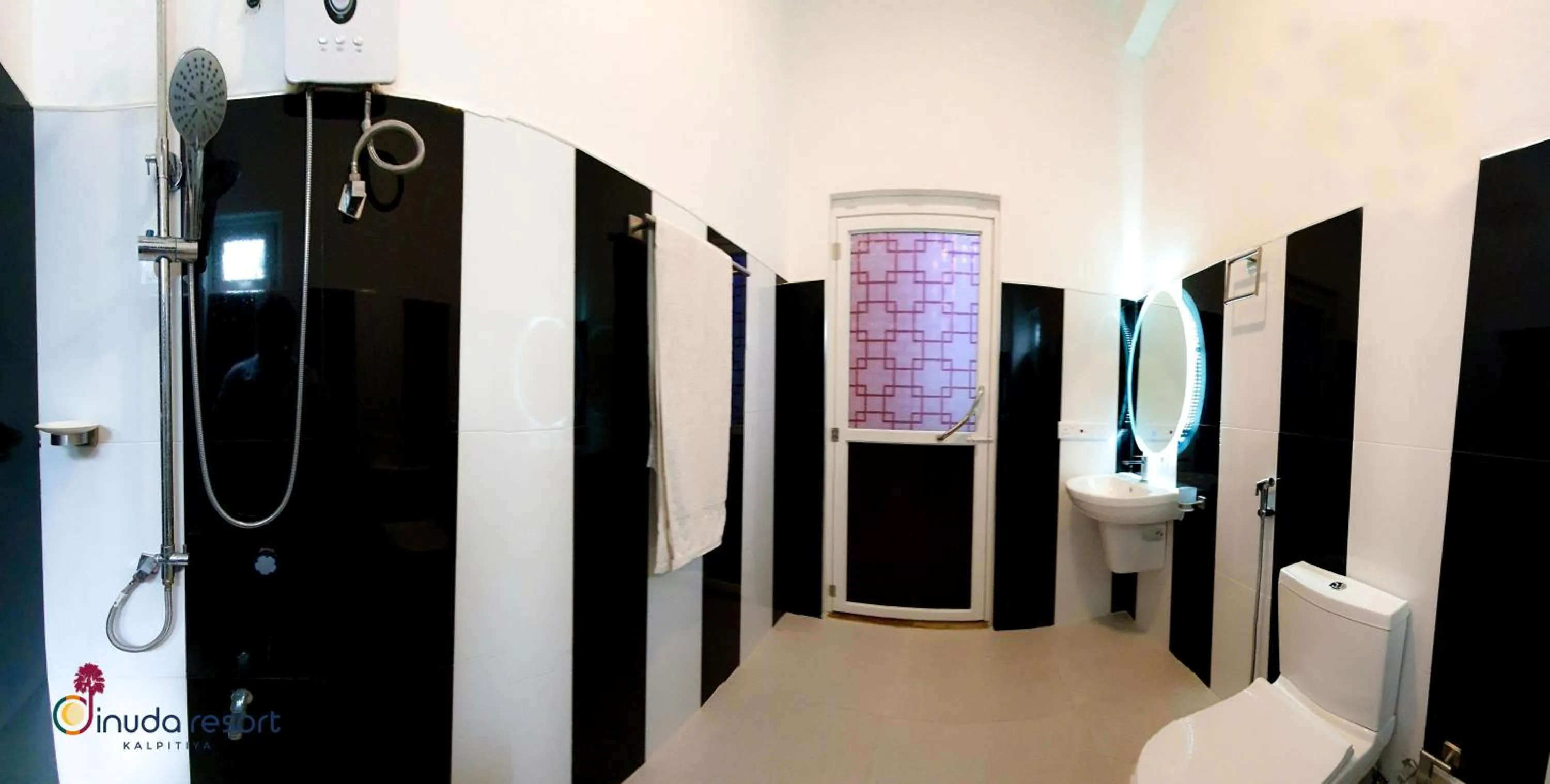 Shower in Dinuda Lagoon Hotel