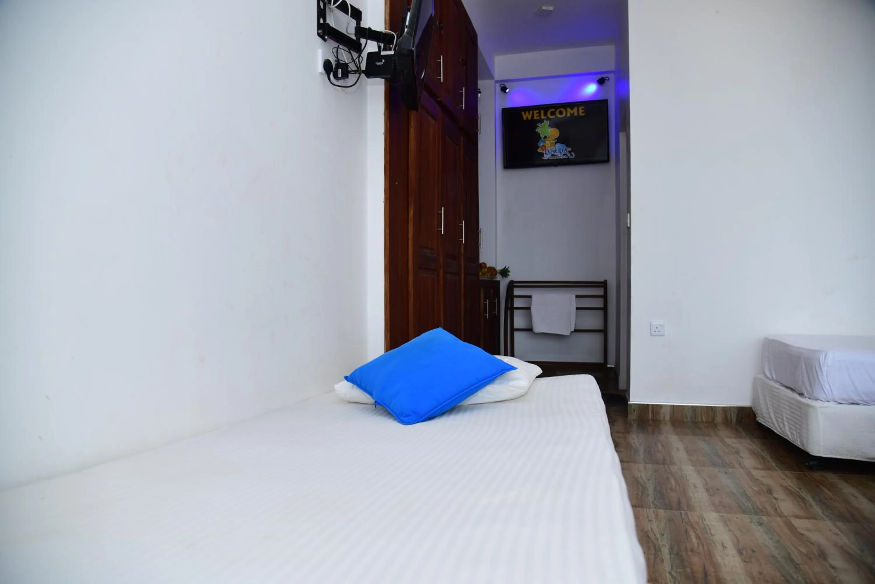 TV and multimedia, Bed in Dinuda Lagoon Hotel
