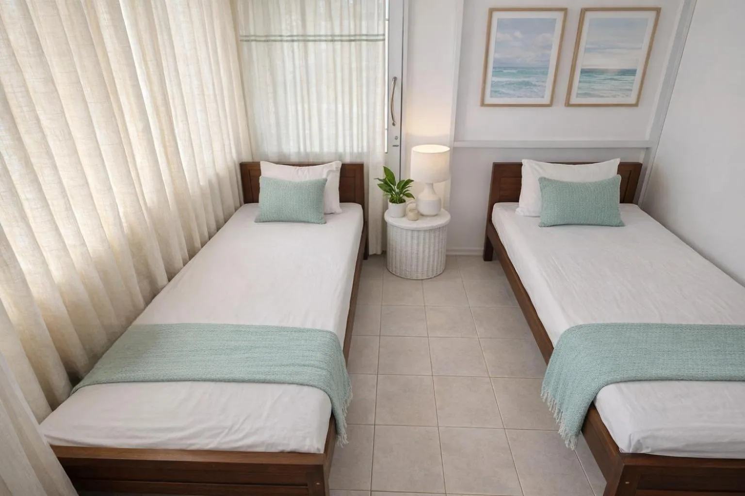Bed in Dinuda Lagoon Hotel