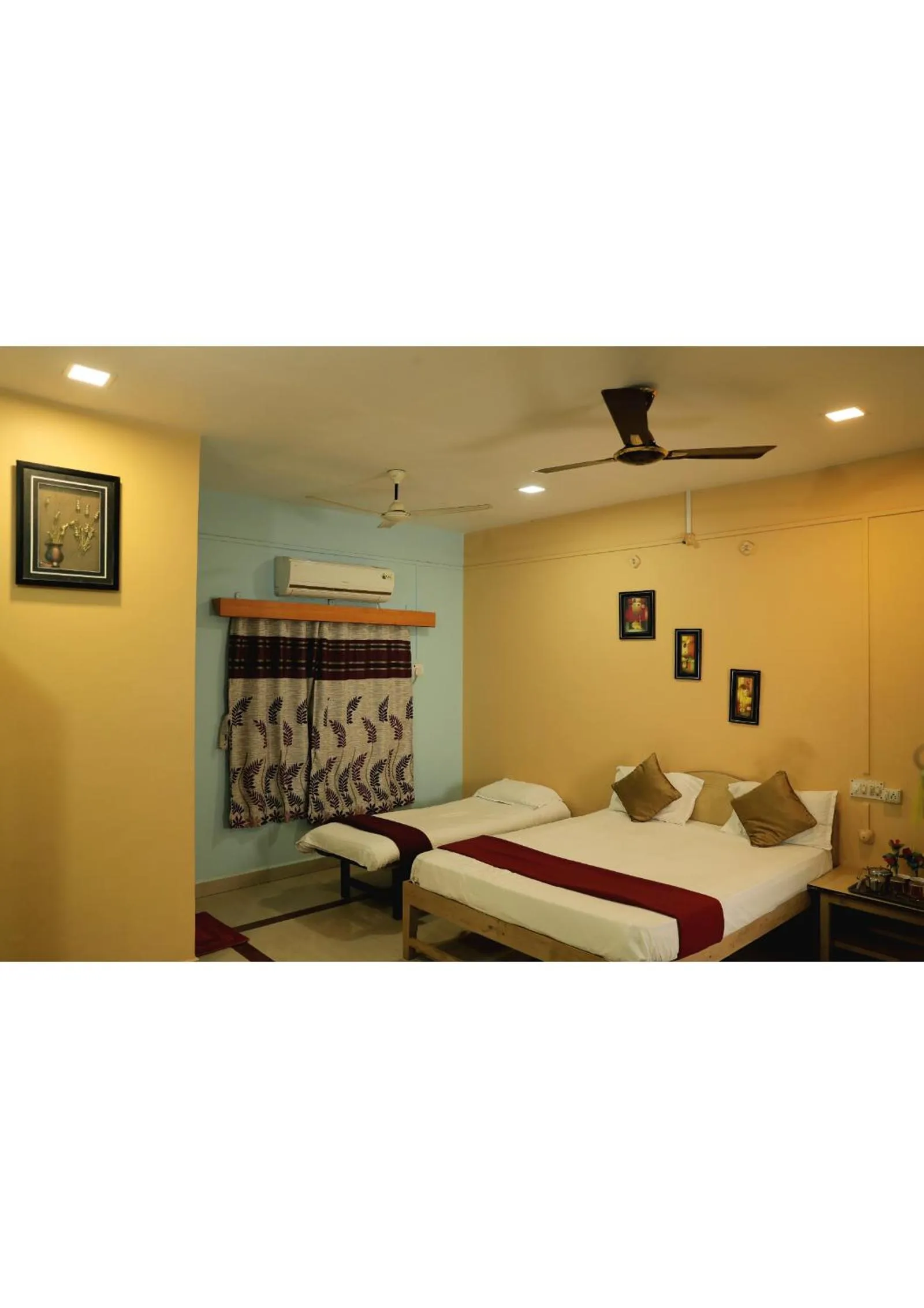 Bed in Nisarg Resort