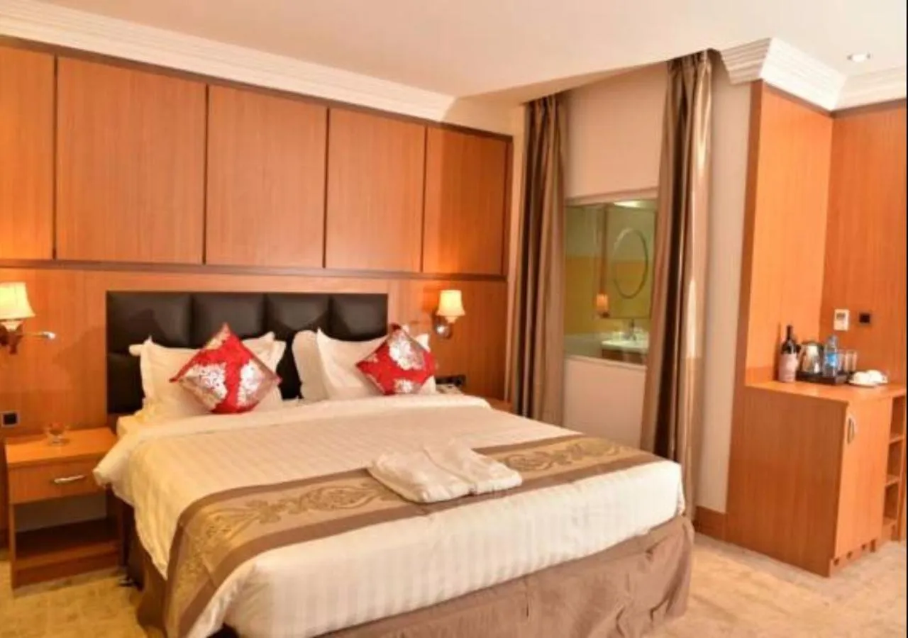 Photo of the whole room, Bed in Grand Pela Hotel & Suites