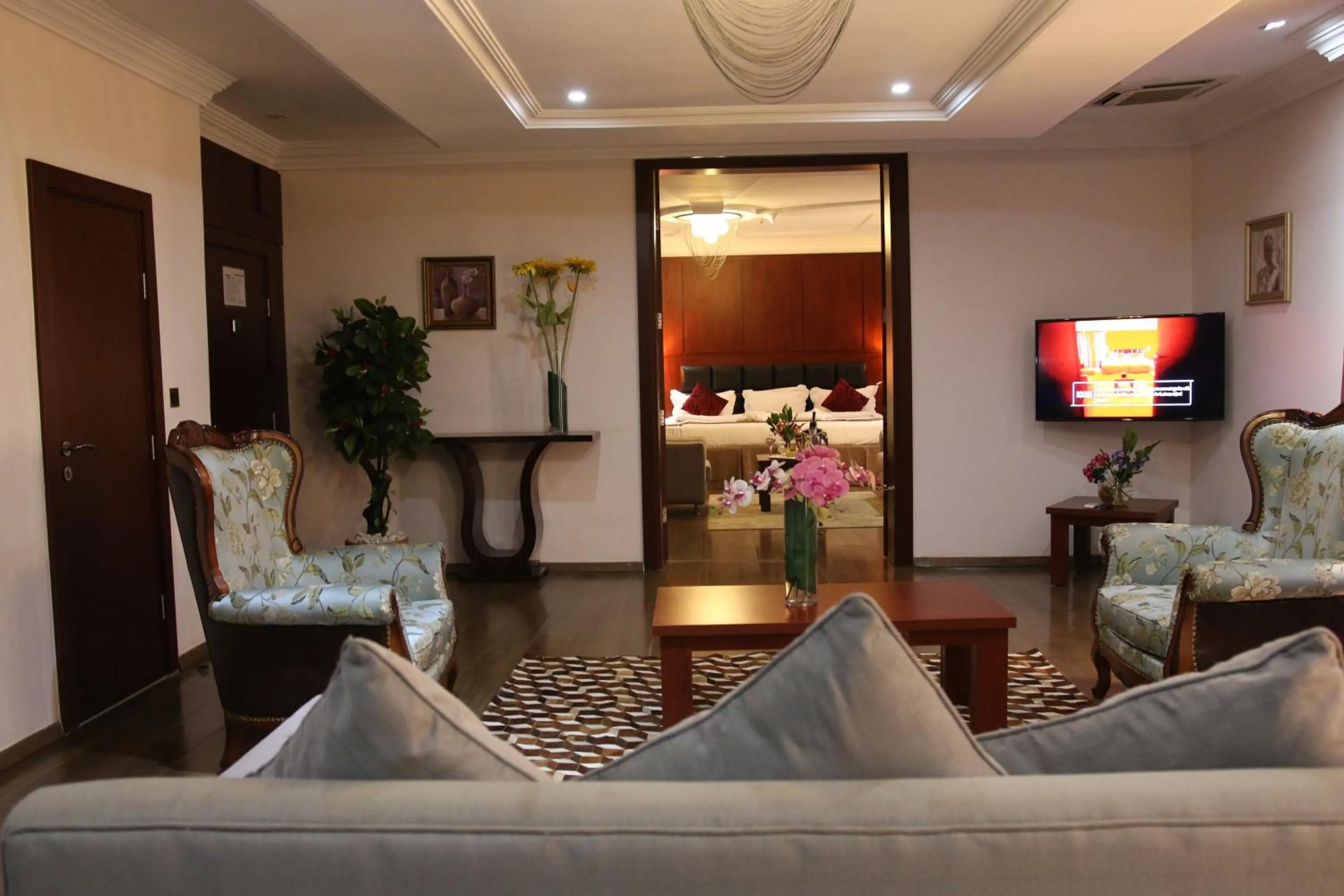 Bed in Grand Pela Hotel & Suites