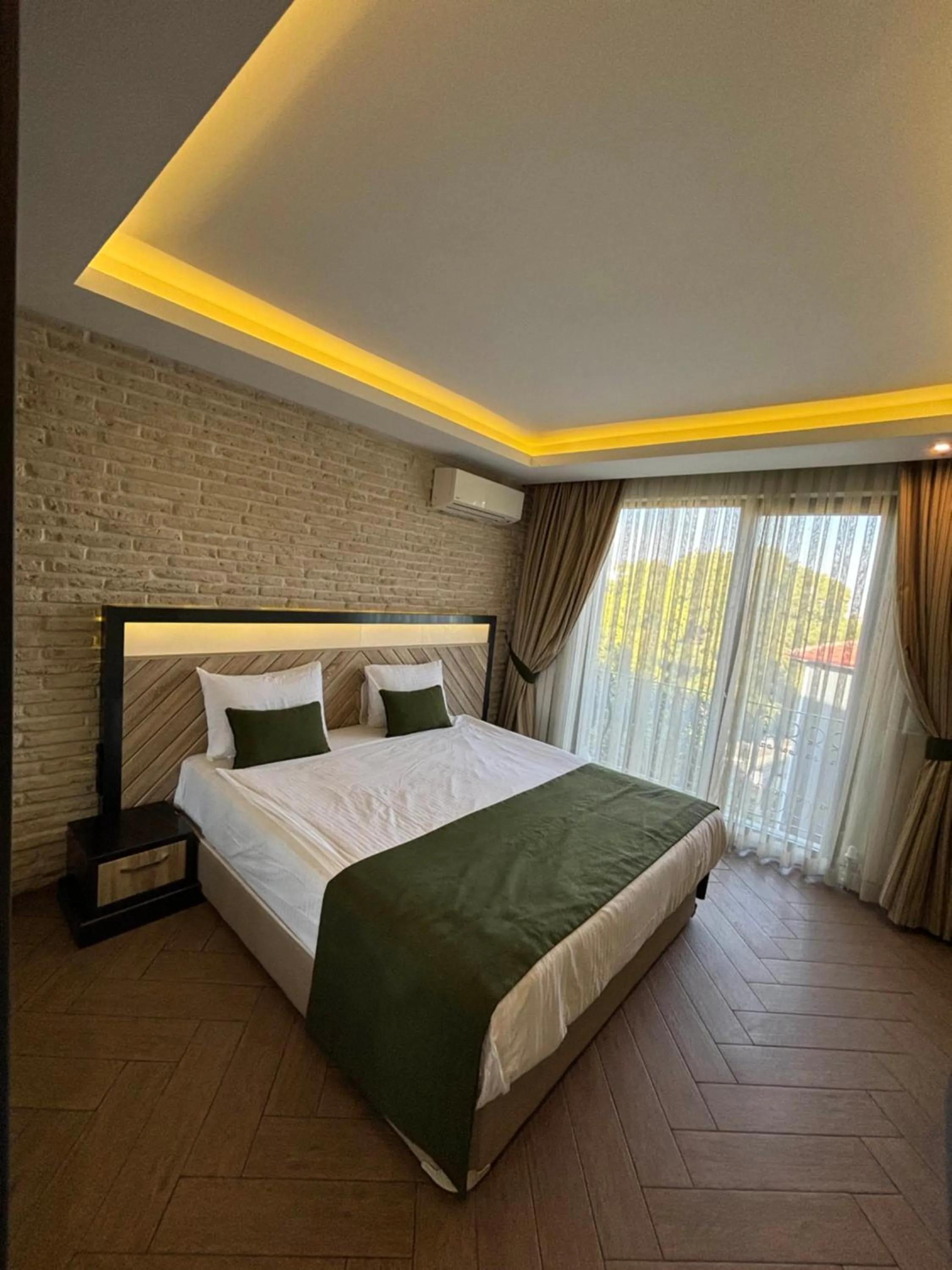 Bed in Aldino Residence