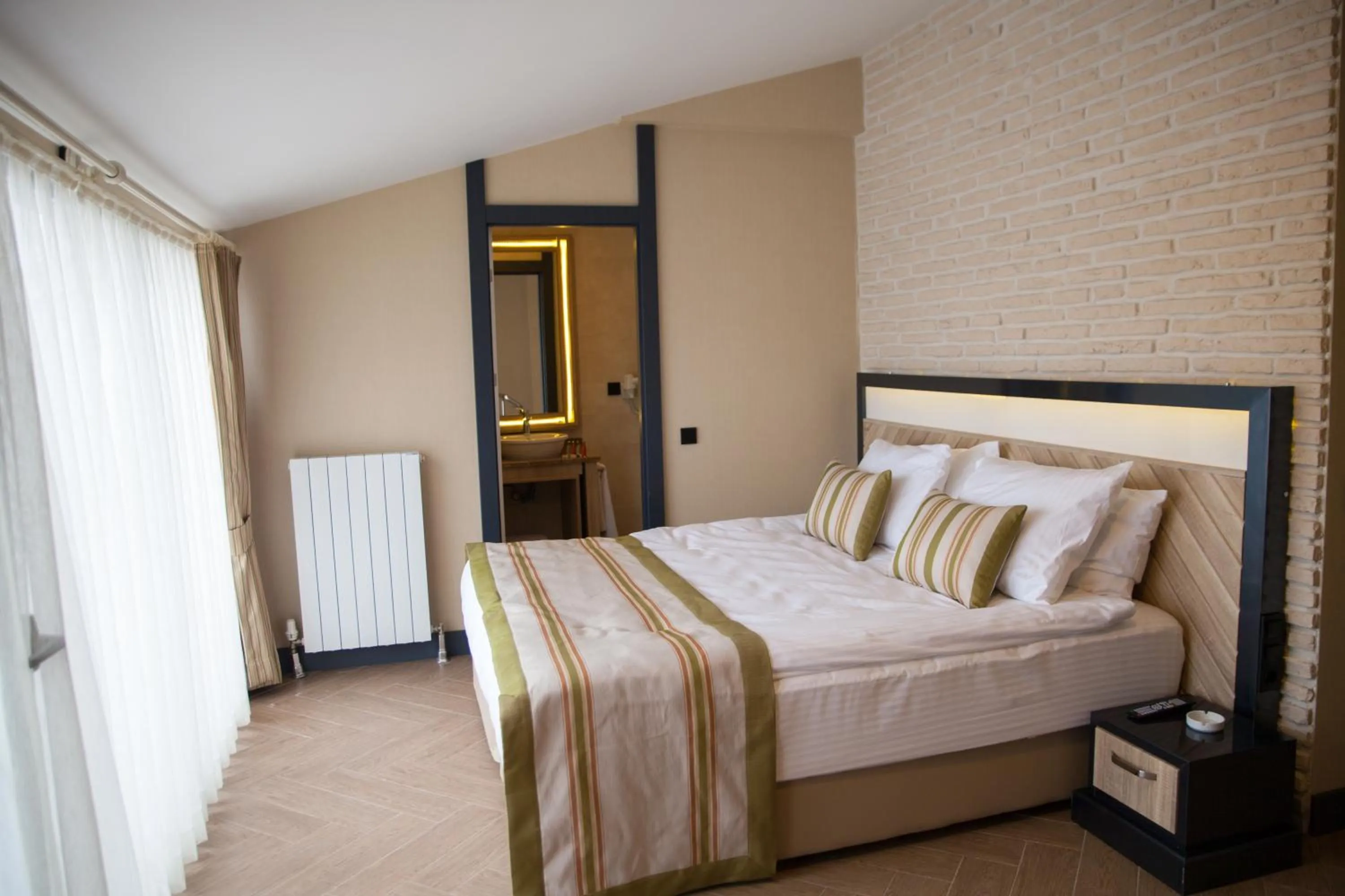 Bed in Aldino Residence