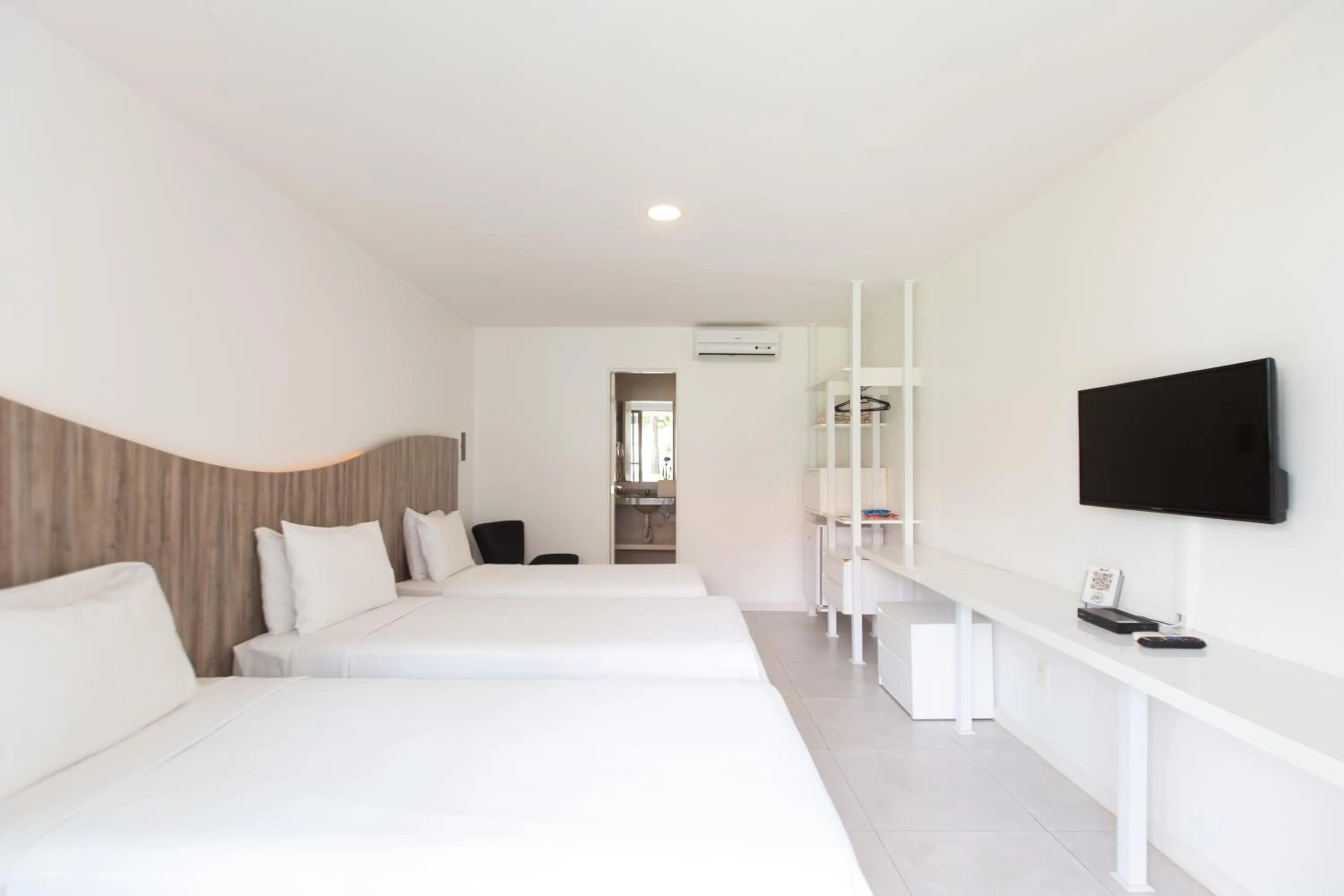 Bed in Duro Beach Garden Hotel