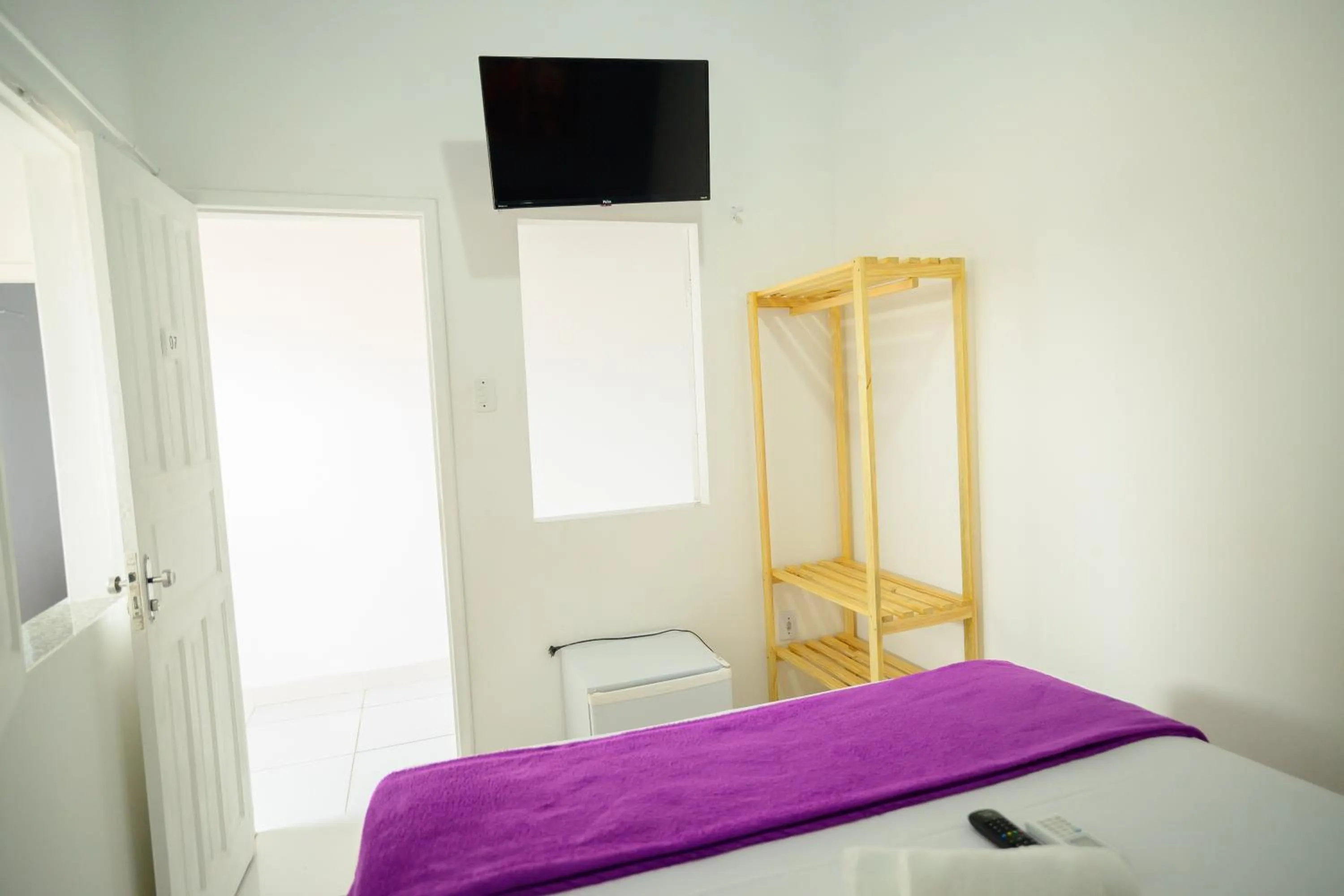 Communal lounge/ TV room, Bed in Pousada Pimenta Nativa