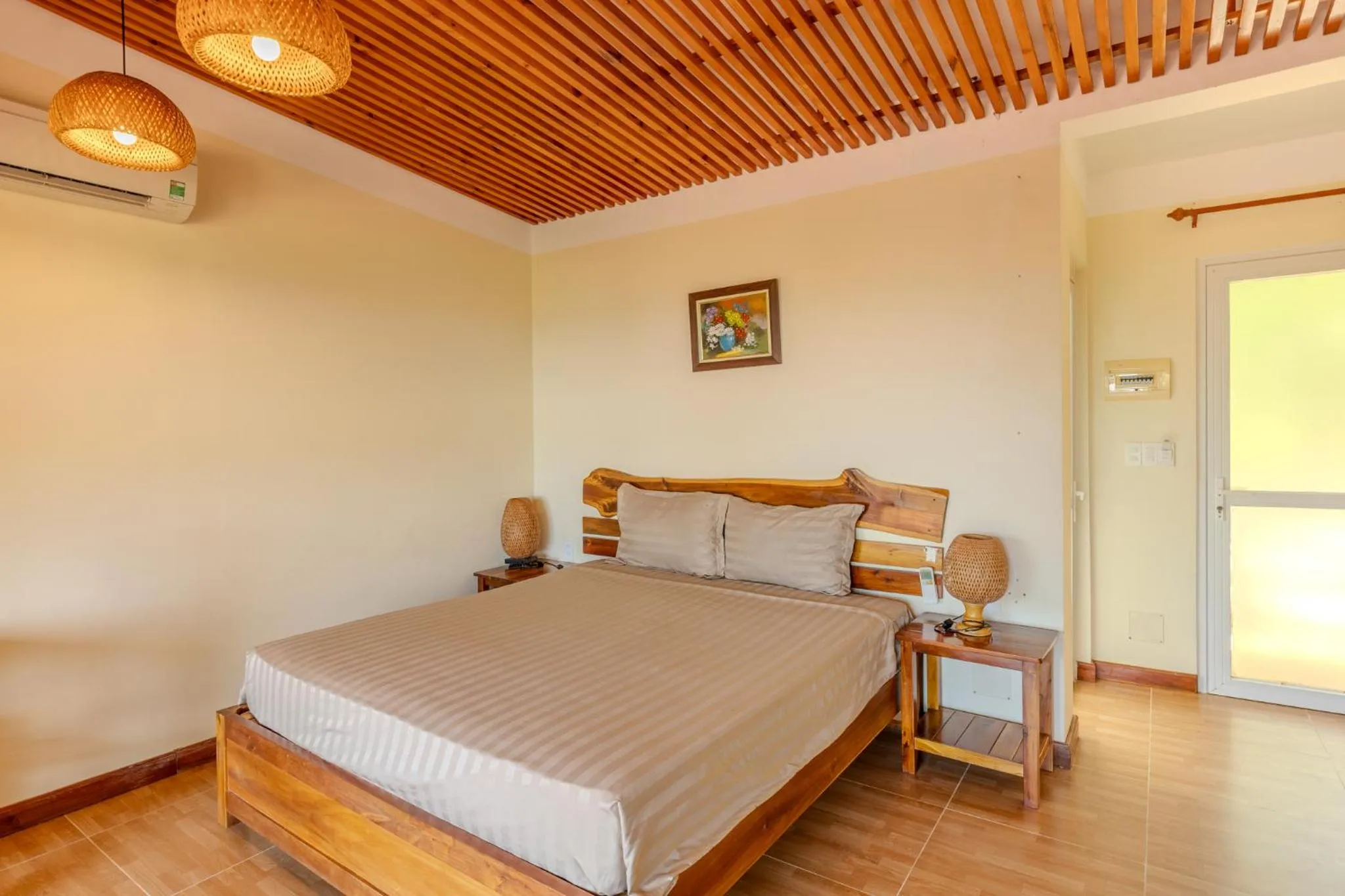Bed in Mango Beach Resort