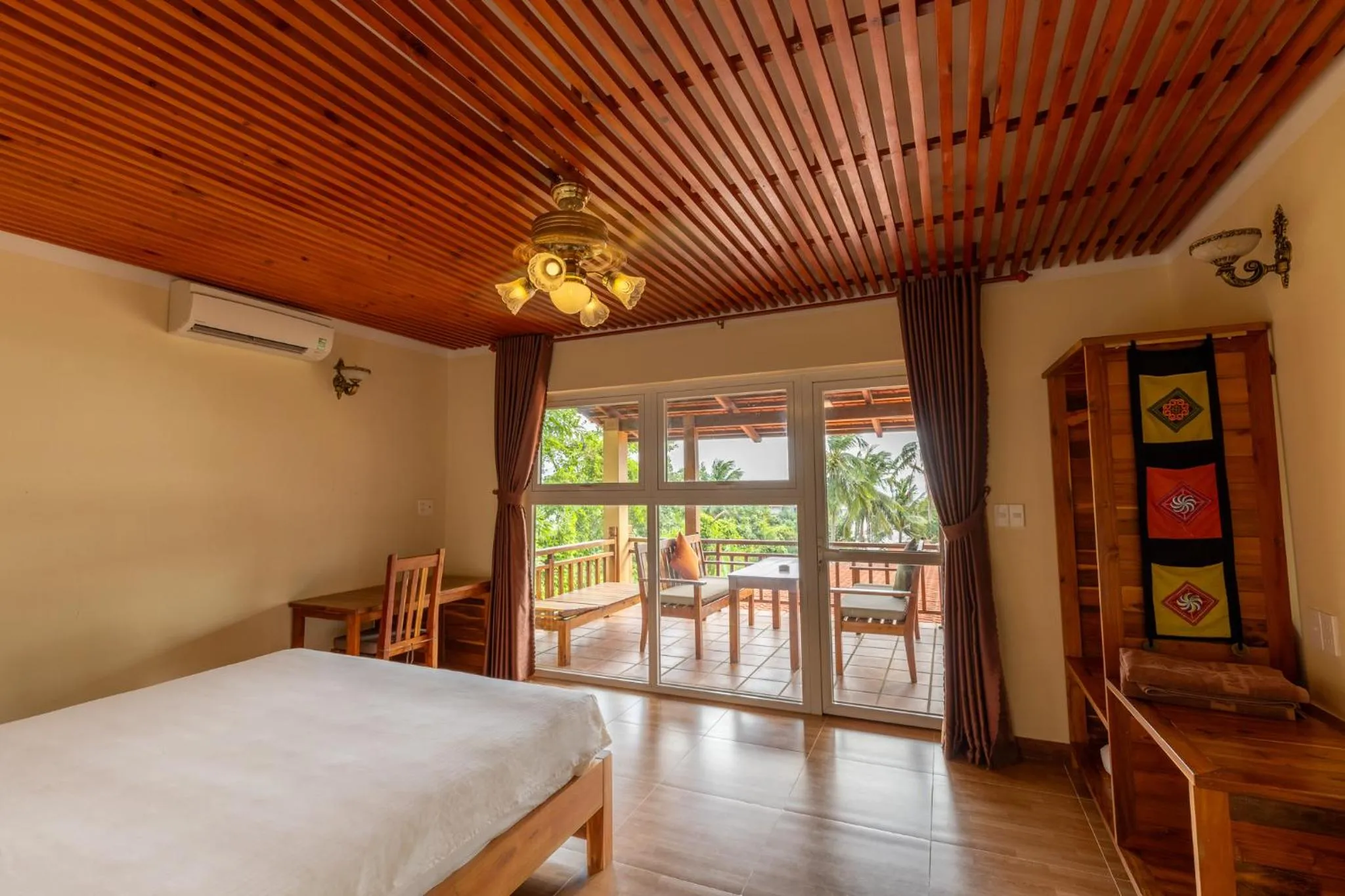 Bed in Mango Beach Resort