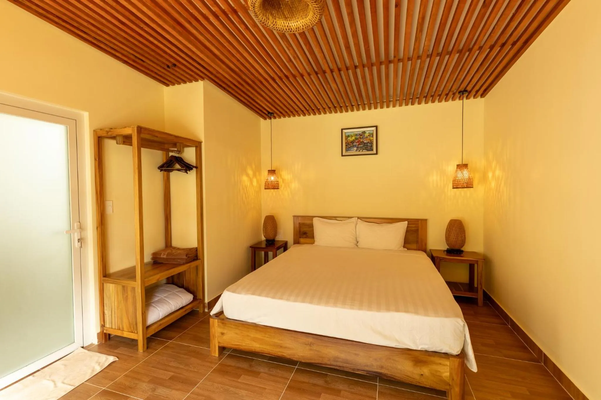 Bed in Mango Beach Resort