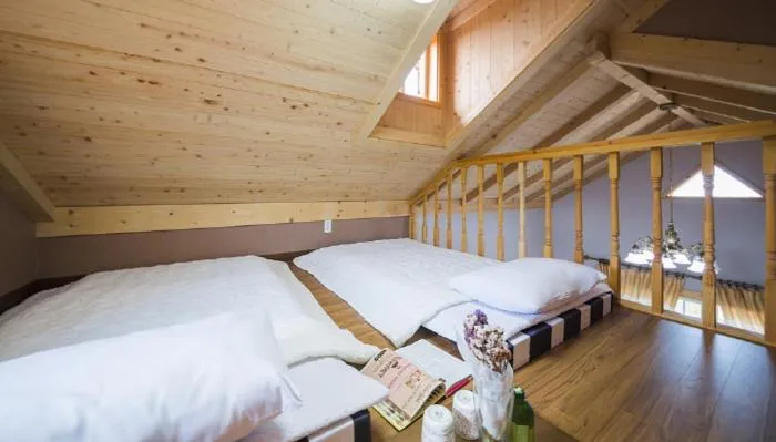 Bed in Red Windmill Pension