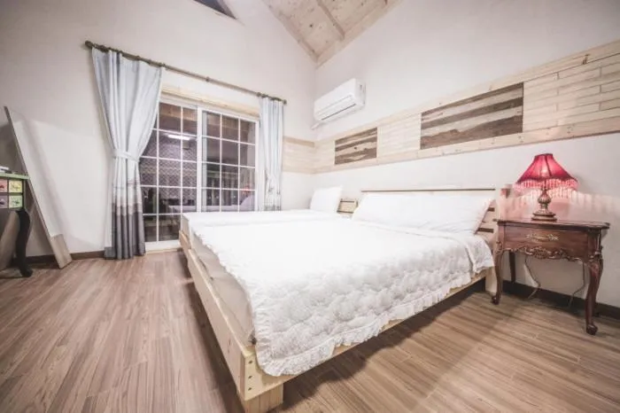 Bed in Red Windmill Pension