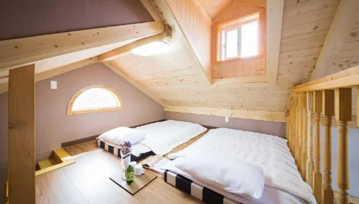 Bed in Red Windmill Pension