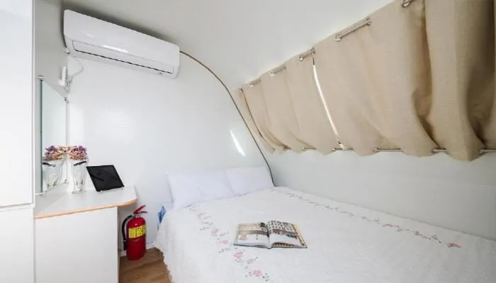 Bed in Red Windmill Pension