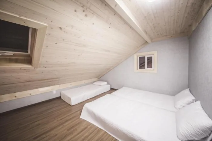 Bed in Red Windmill Pension