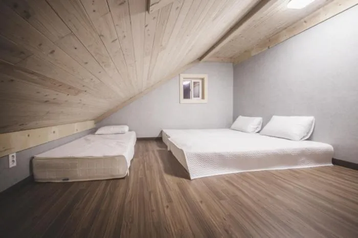 Bed in Red Windmill Pension