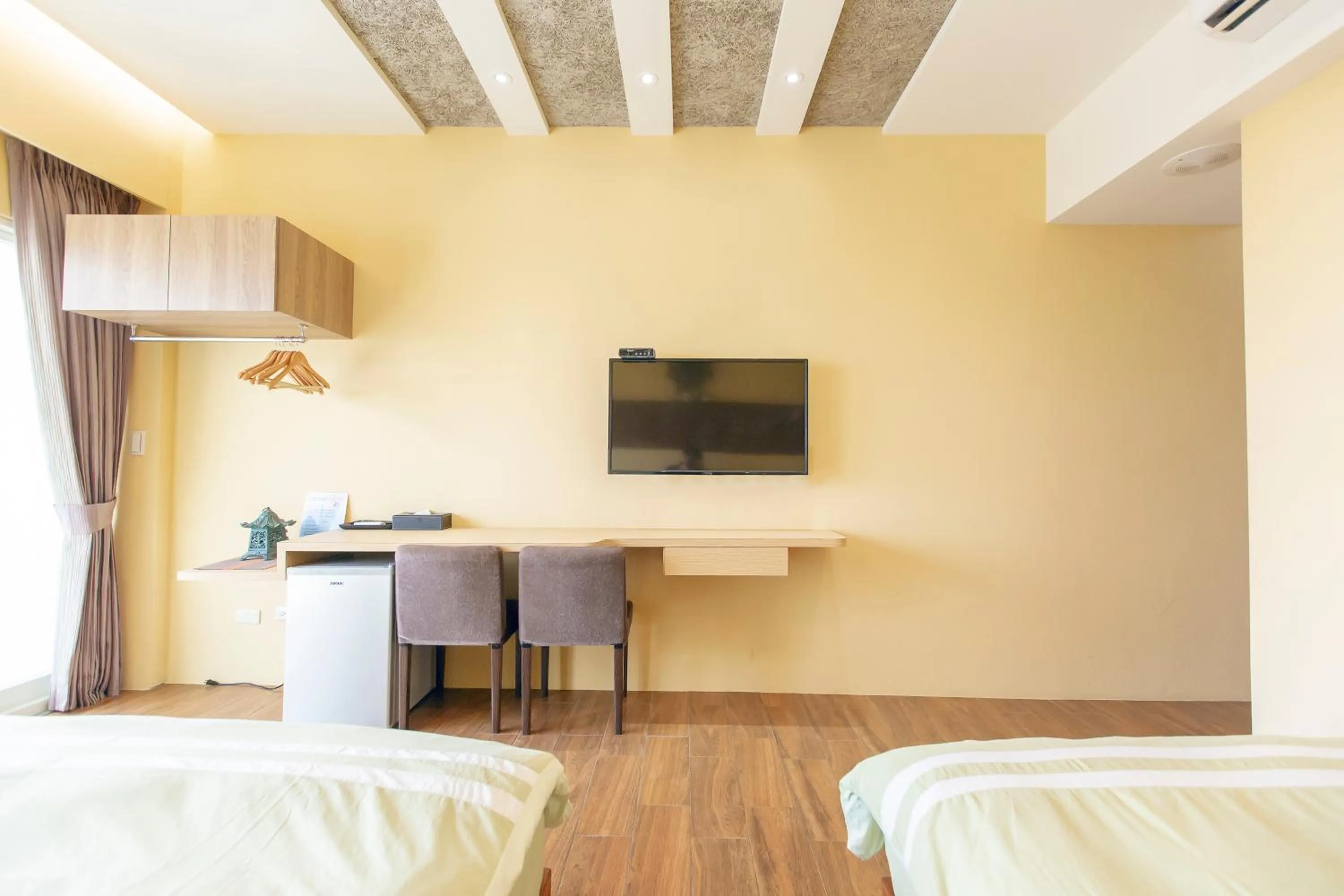 Bed in 龍家民宿 The Laid-back Dragon Lodge