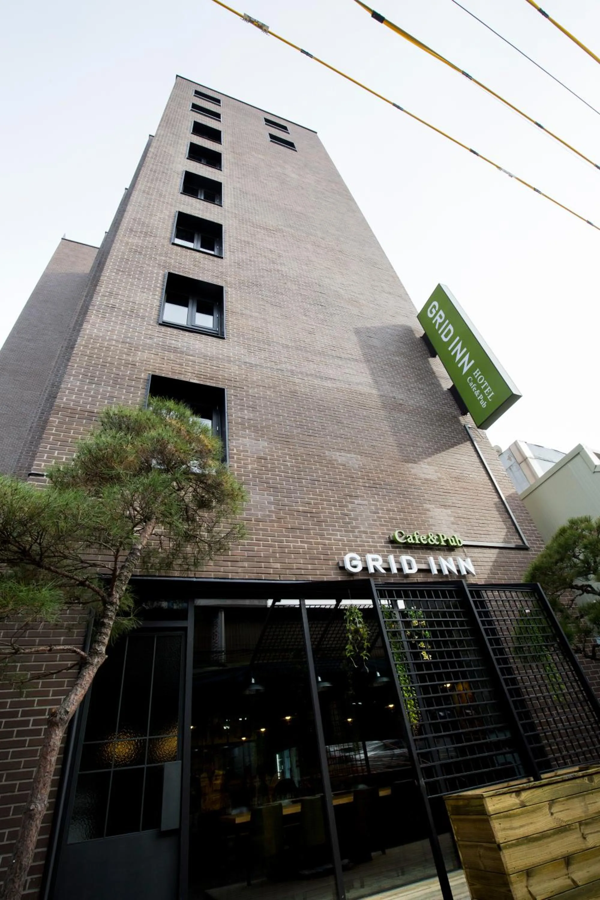 Facade/entrance in Grid Inn Hotel