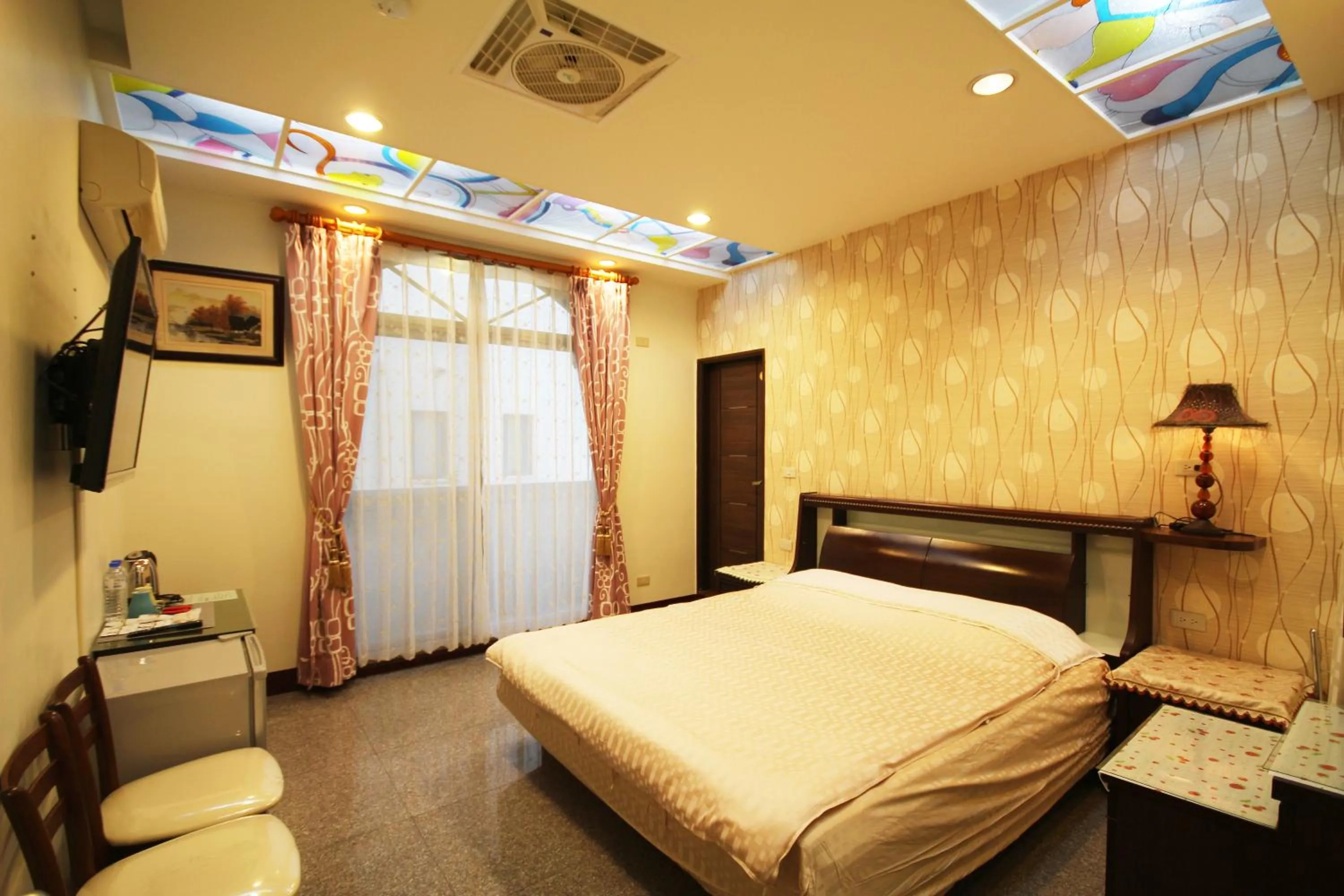 Bed in Pingguo De Jia Du Jia Homestay