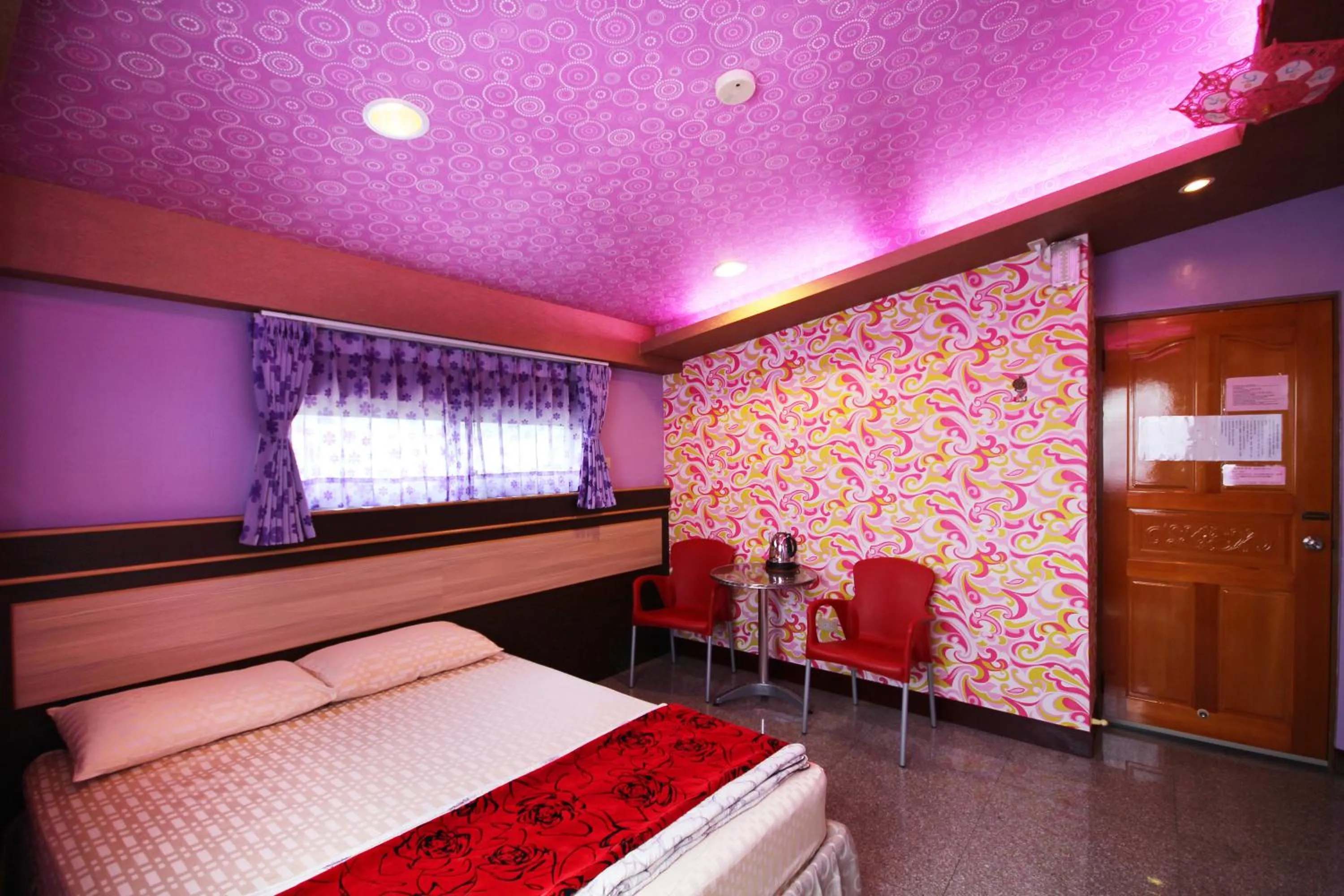 Bed in Pingguo De Jia Du Jia Homestay