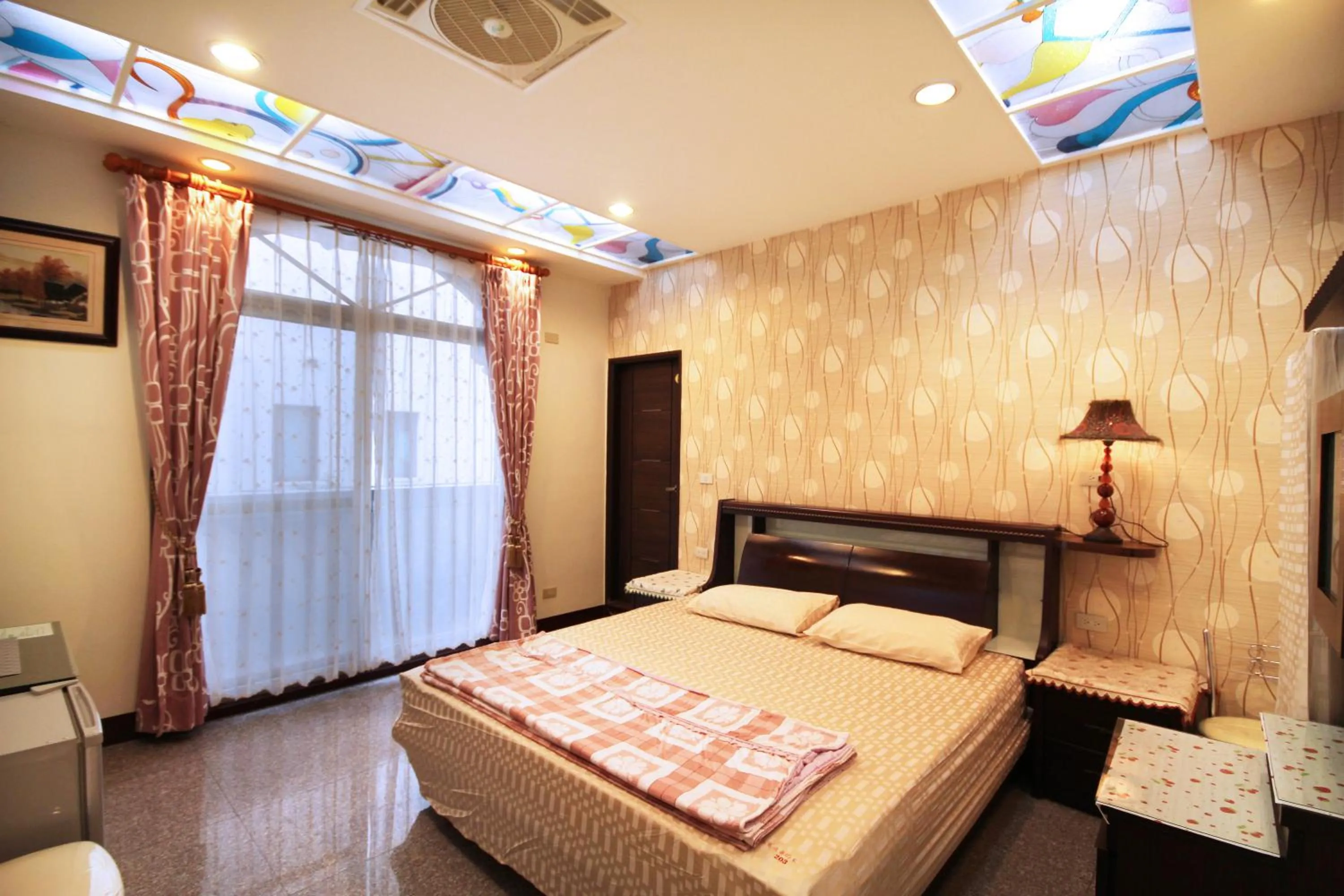 Bed in Pingguo De Jia Du Jia Homestay