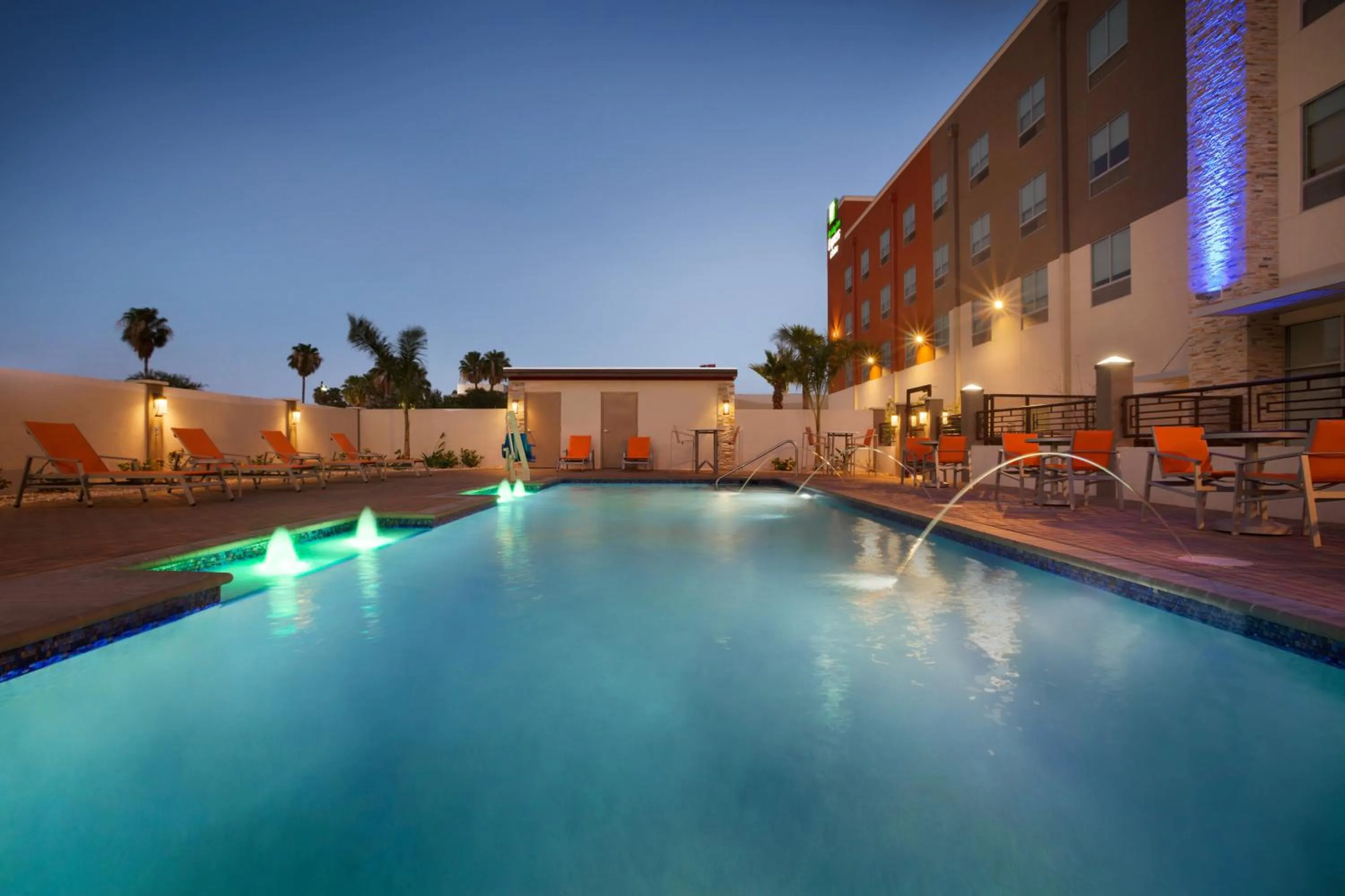 Swimming pool in Holiday Inn Express & Suites - McAllen - Medical Center Area by IHG