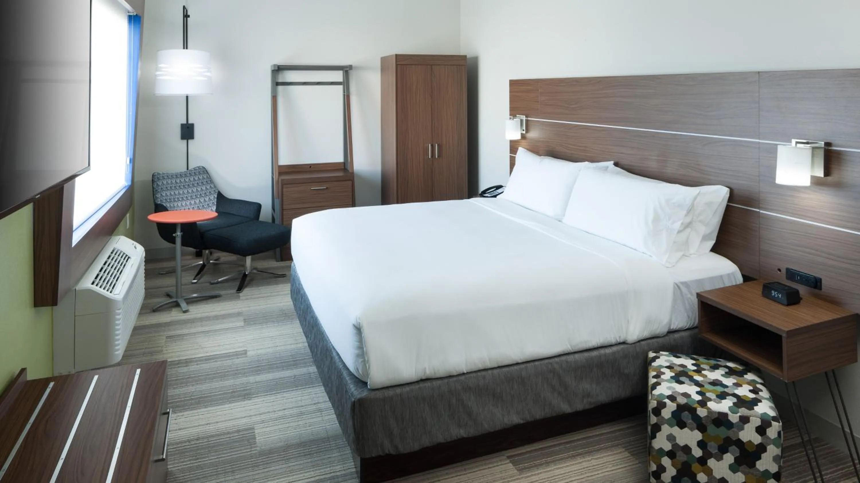 Photo of the whole room, Bed in Holiday Inn Express & Suites Orlando At SeaWorld by IHG - With Free Shuttle Service to SeaWorld Parks