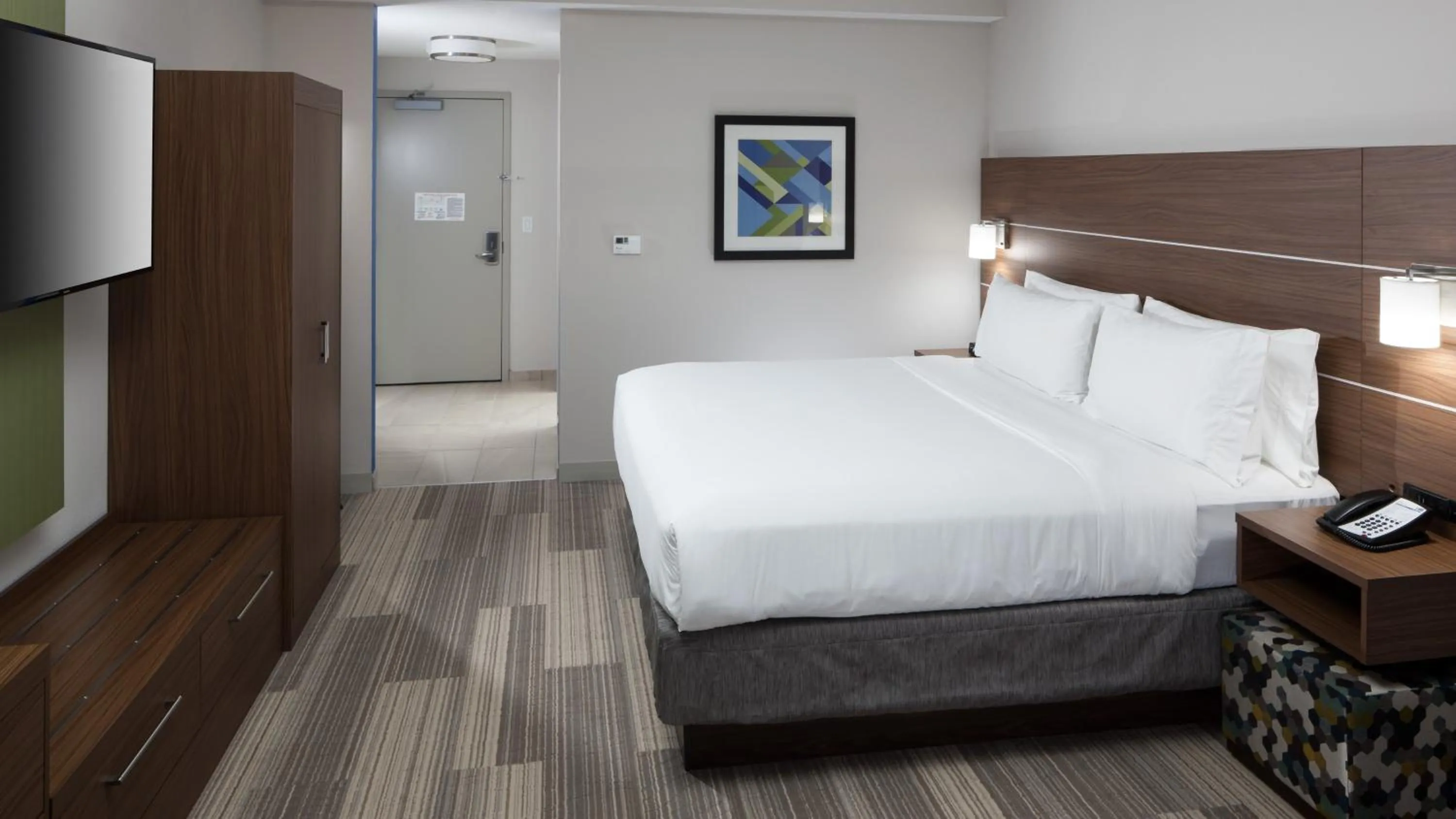 Photo of the whole room, Bed in Holiday Inn Express & Suites Orlando At SeaWorld by IHG - With Free Shuttle Service to SeaWorld Parks