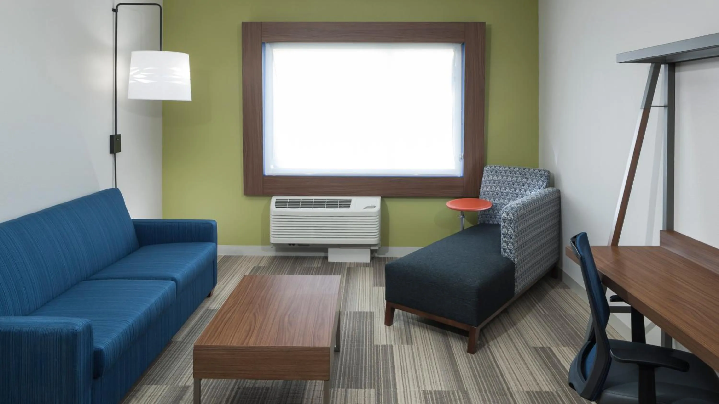 Photo of the whole room in Holiday Inn Express & Suites Orlando At SeaWorld by IHG - With Free Shuttle Service to SeaWorld Parks