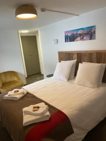 Bed in Hôtel La Grande Lanière