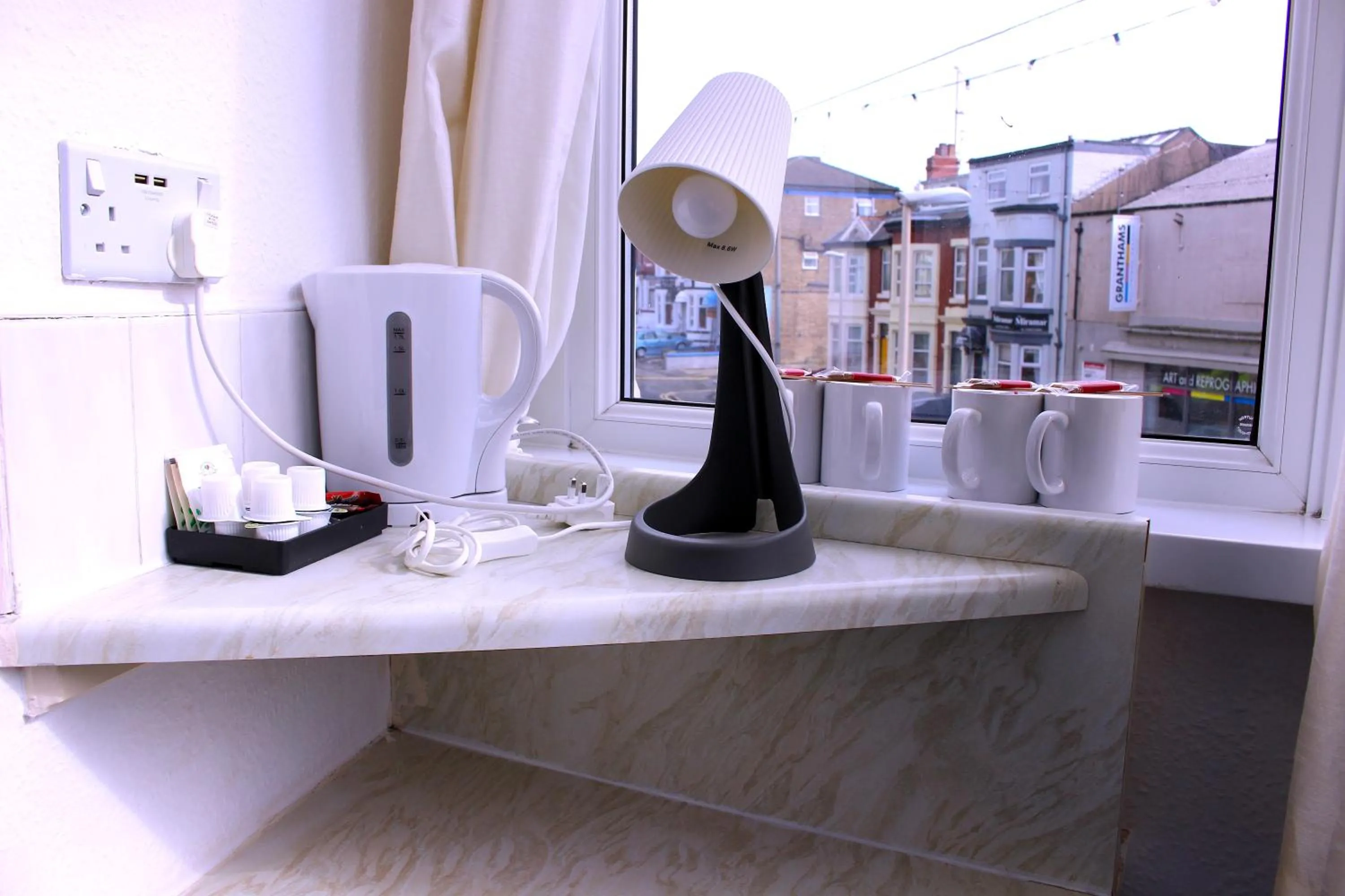 Bedroom in The Regency Hotel