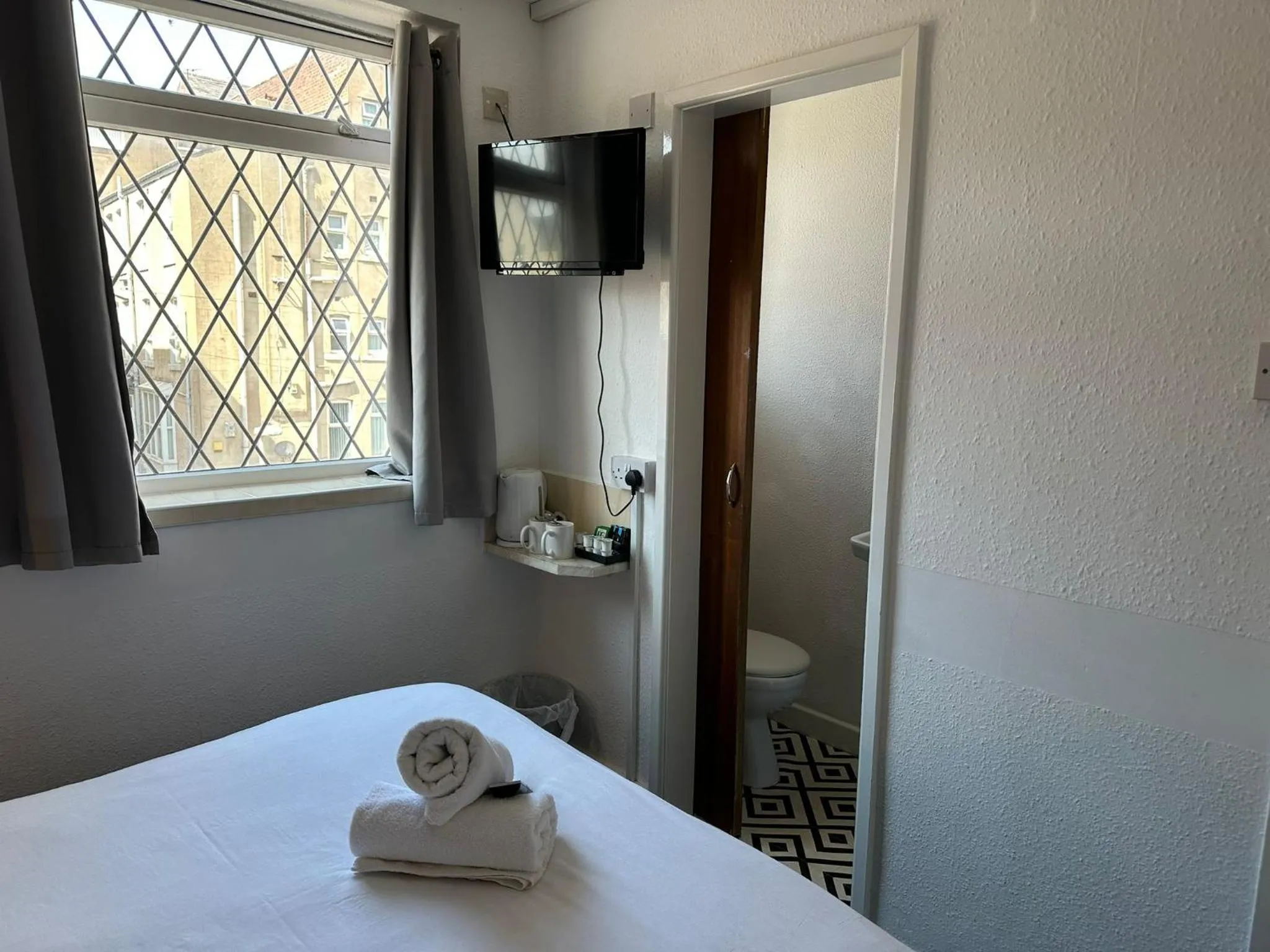 Bed in The Regency Hotel