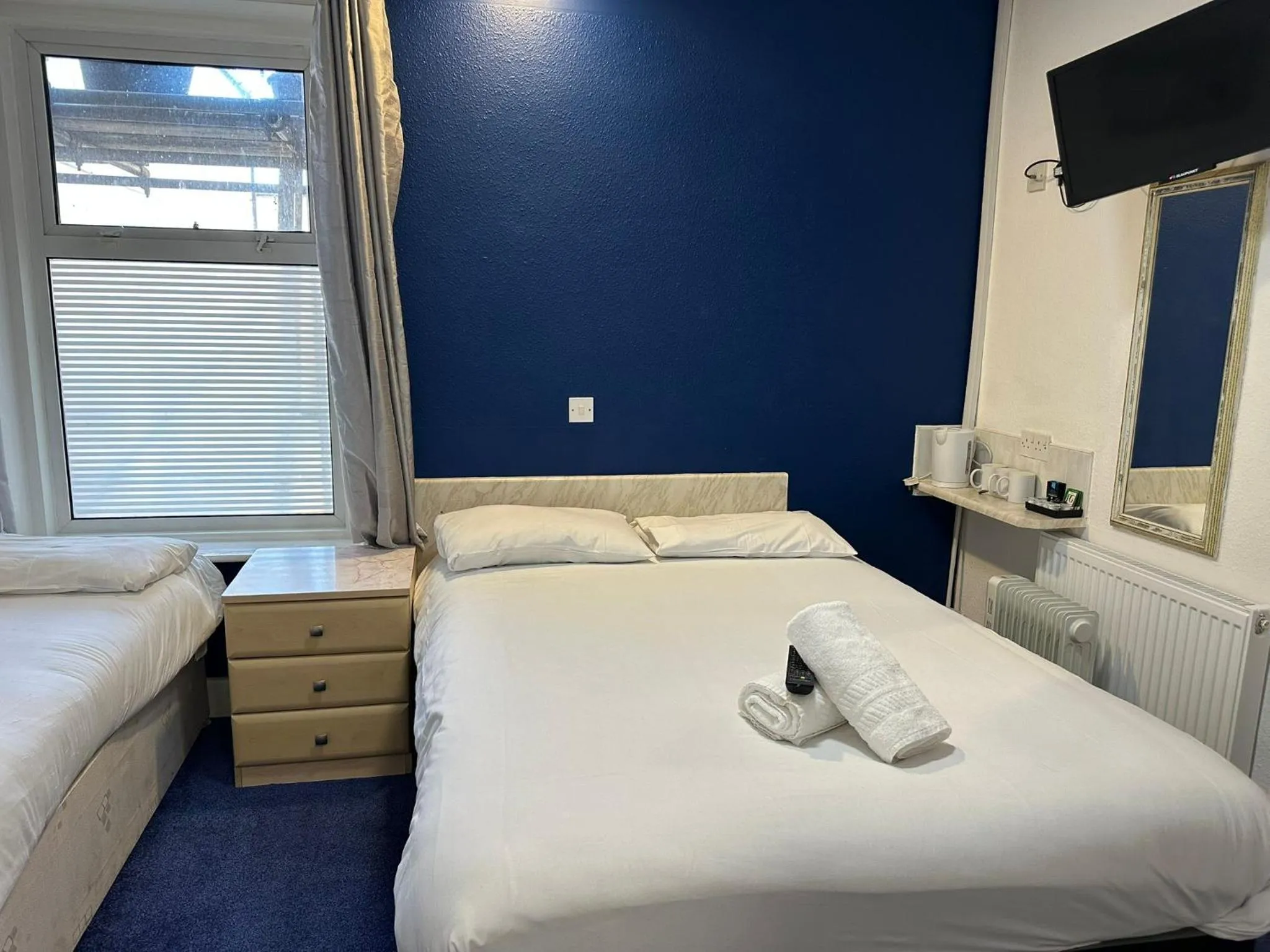 Bedroom, Bed in The Regency Hotel