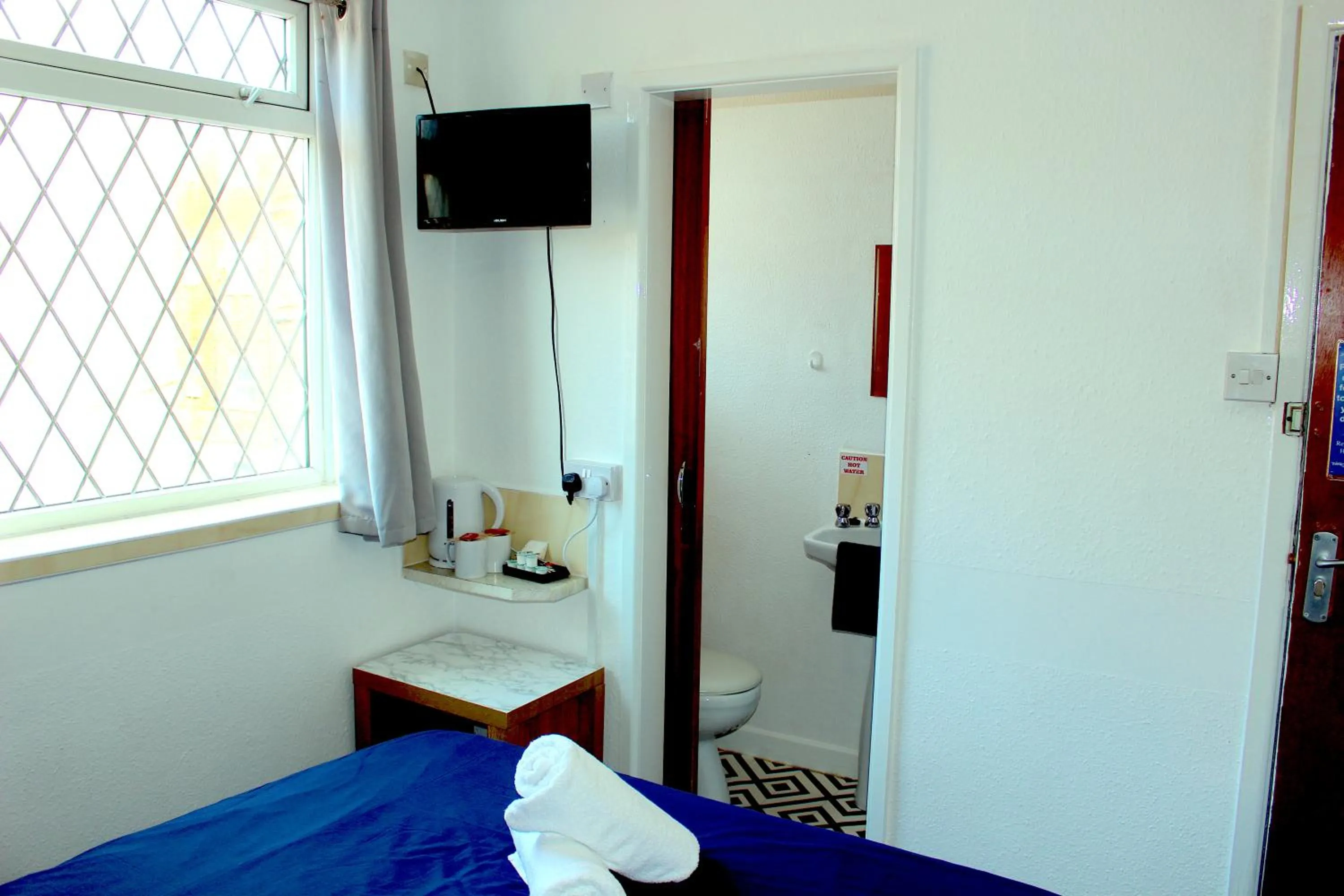 Bedroom, Bed in The Regency Hotel