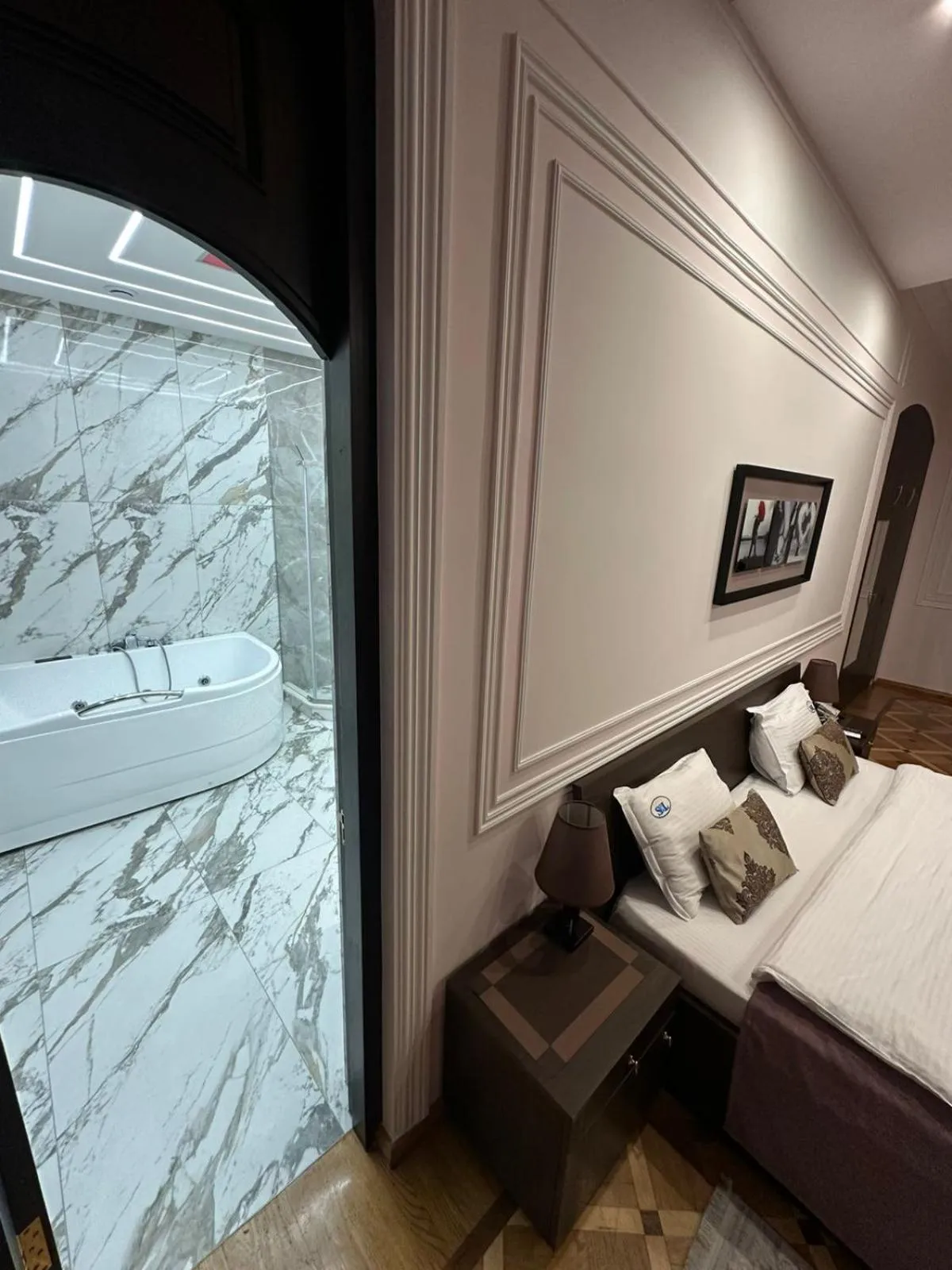 Bed in S&L Boutique Hotel